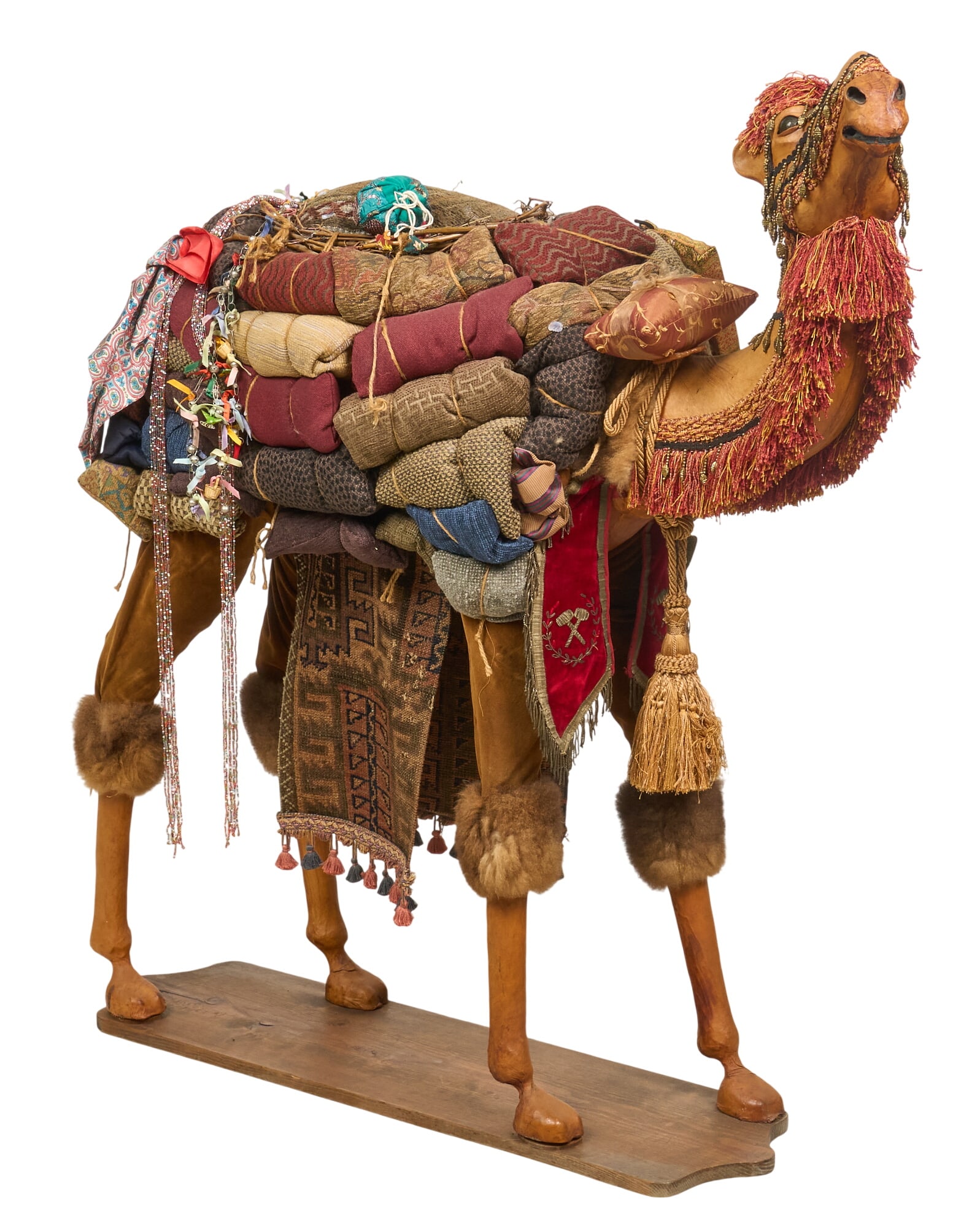 Decorated Nativity Camel: Highly decorated Nativity camel sculpture, with fabric, beaded, and tassel details height 51 in. x width 48 in. x depth 19 in. Provenance: Property from a home in San Antonio, Texas 