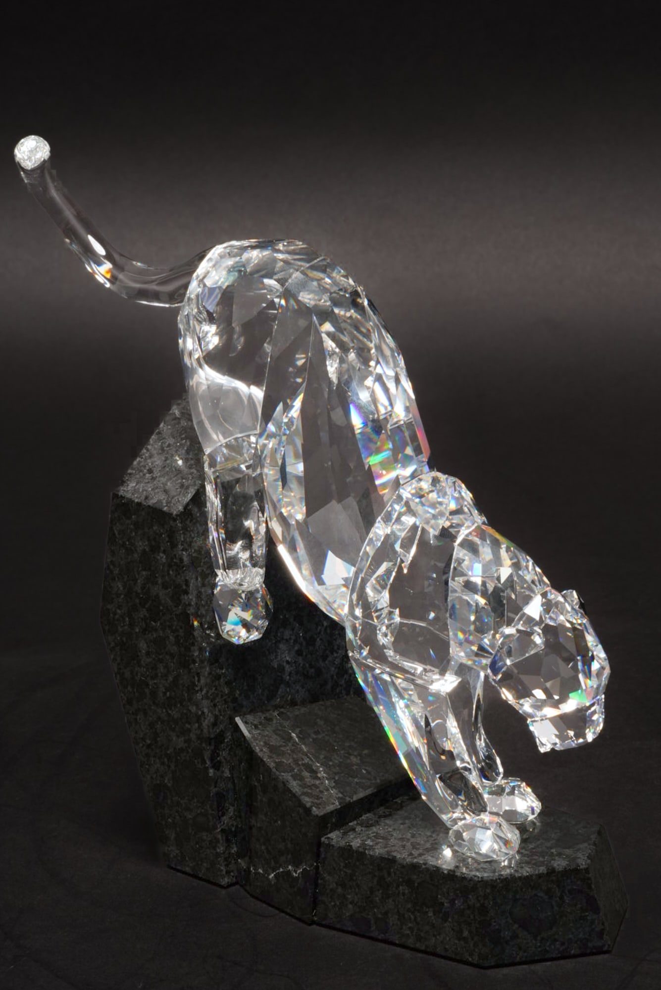 Swarovski Panther Figurine: Swarovski panther crystal figurine, includes foam-lined storage box, with card, cleaning cloth, and Certificate booklet height 7.5 in. x length 8 in. x width 2.5 in. / figurine height 6.75 in.