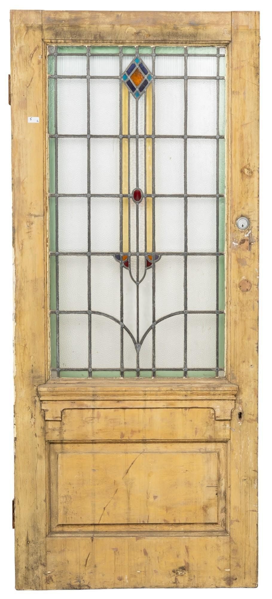 Stained Glass Door: Stained glass door with wooden frame, and metal hardware height 79 in. x width 34 in. x depth 2 in. Provenance: Property from a home in San Antonio, Texas