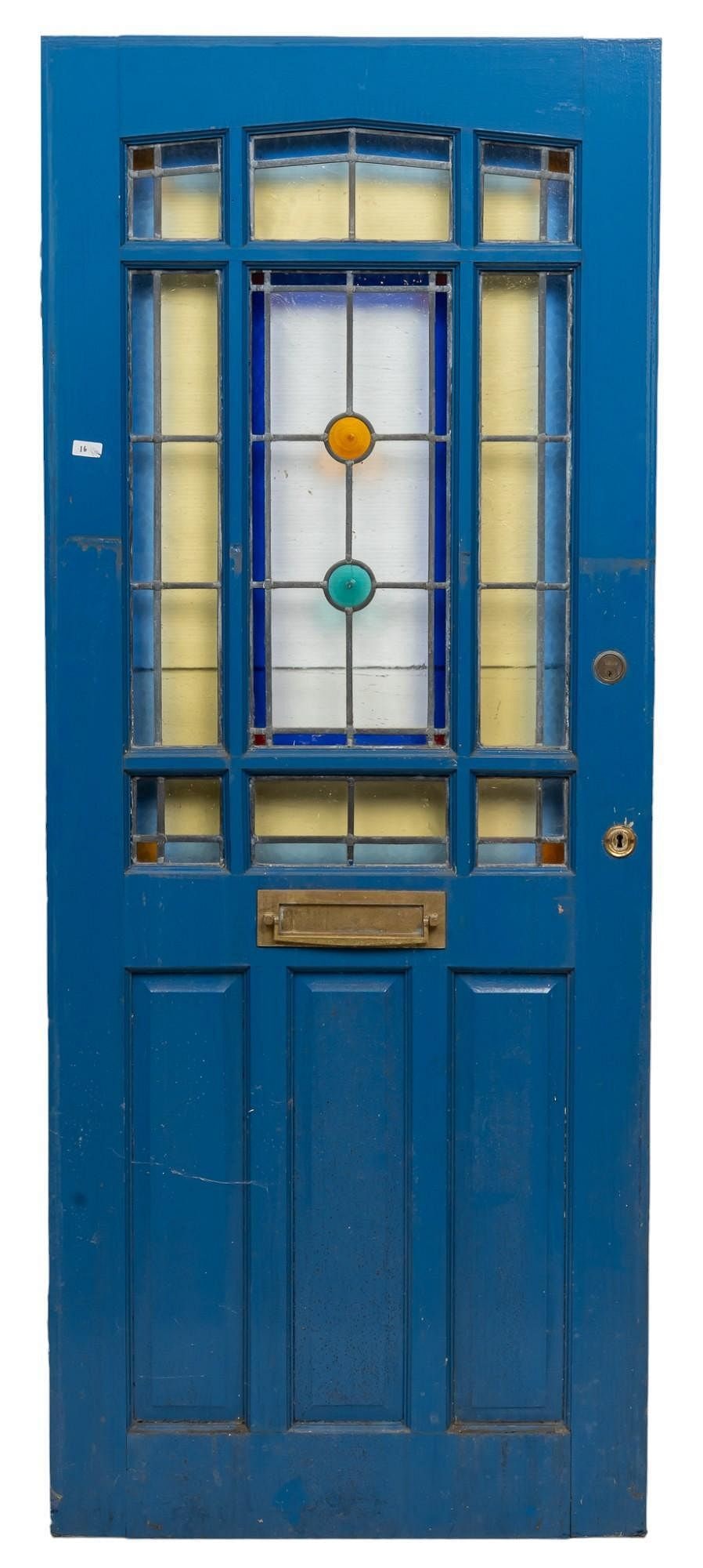 Stained Glass Door: Stained glass door with wooden frame, and metal hardware height 79.5 in. x width 33 in. x depth 2 in. Provenance: Property from a home in San Antonio, Texas