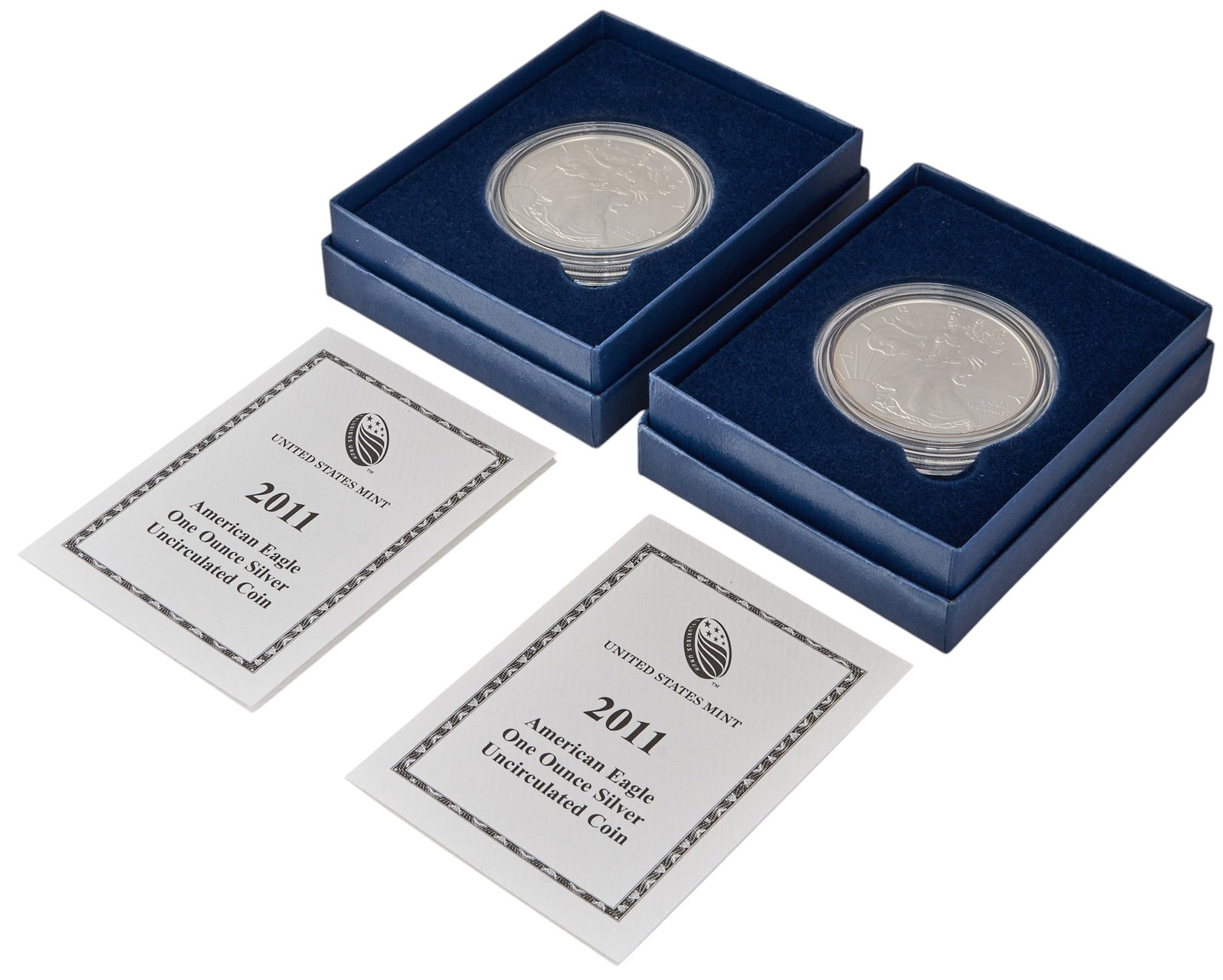 (2) 2011 Uncirculated American Silver Eagle Coins: Two uncirculated American fine silver eagle coins Provenance: Property from an estate collection at a home in the Lincoln Heights neighborhood of San Antonio, Texas