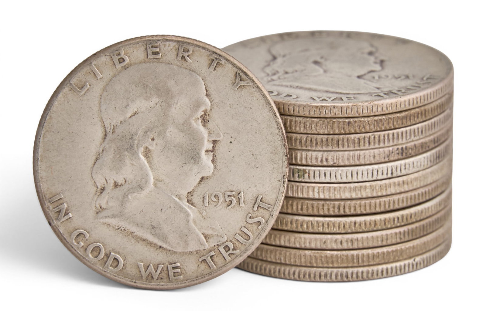 (12) Silver Benjamin Franklin Half Dollars: Twelve silver Benjamin Franklin half dollars Provenance: Property from the New Braunfels, Texas home of award-winning set decorator and artist Mary McIntosh