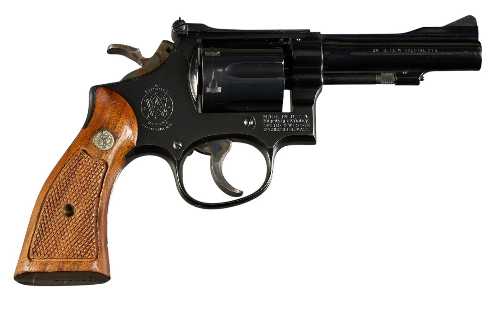 Smith & Wesson Model 15-2 38 Spl Revolver: Serial: K766666 Manufacturer: Smith & Wesson Model: 15-2 Caliber: 38Spl Barrel Length: 4 in. OAL: 9 in. Condition: Good; some light sporadic handling marks; bore is bright & shiny Provenance: 