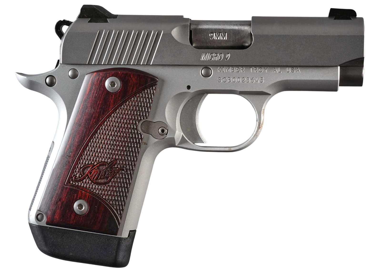 Kimber Micro 9 Semi Auto Pistol: Serial: SCB0028645 Manufacturer: Kimber-Troy, AL Model: Micro 9 Caliber: 9mm Barrel Length: 3.25 in. OAL: 6.25 in Condition: Good; very light wear & handling marks throughout; bore is good with st