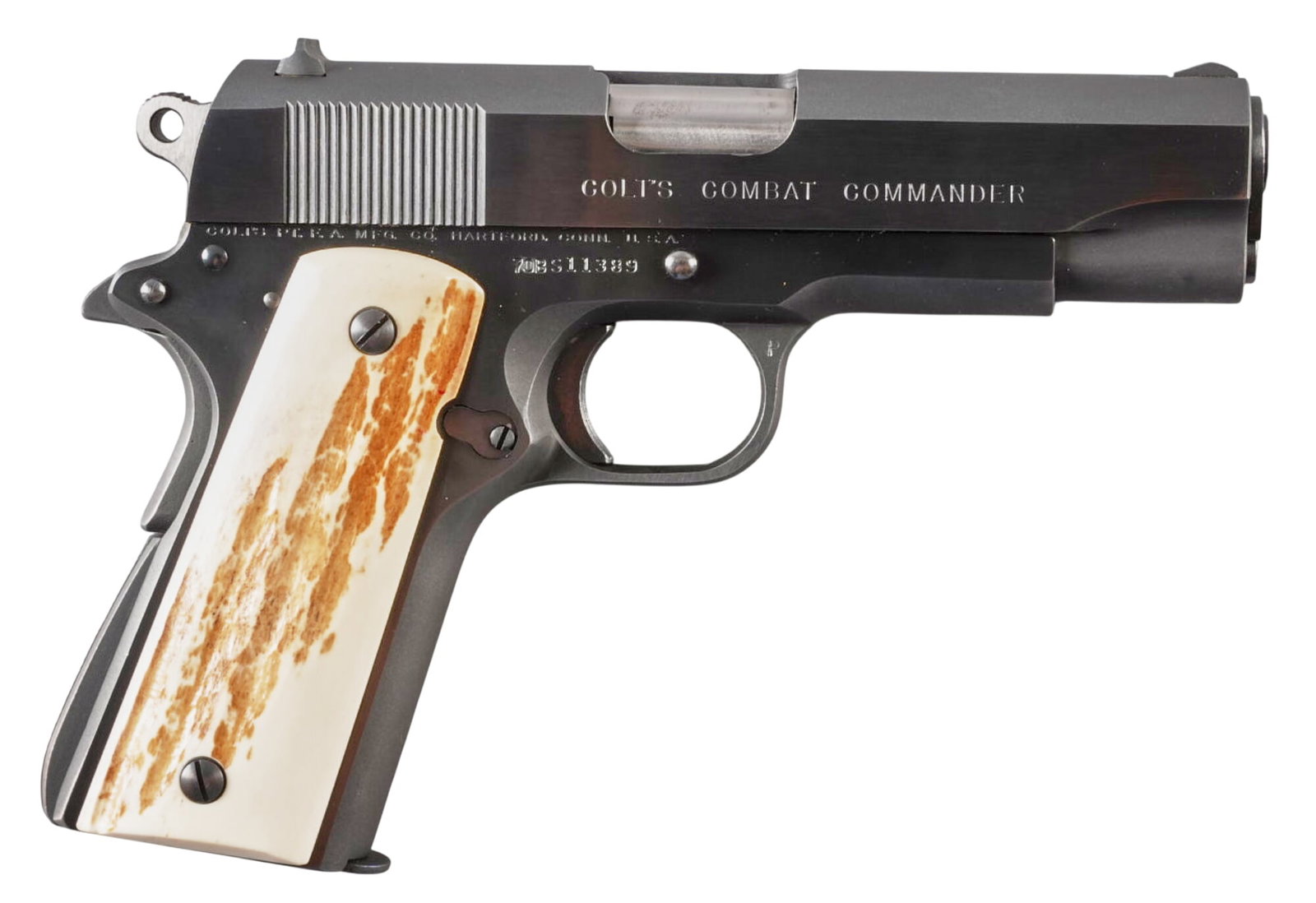 Colt Combat Commander 9mm Semi Auto Pistol: Serial: 70BS11389 Manufacturer: Colt's PT. F.A. MFG. Co.(c. 1972) Model: Combat Commander Caliber: 9mm Barrel Length: 4.25 in. OAL: 7.75 in. Condition: Very Good; some light friction wear &a