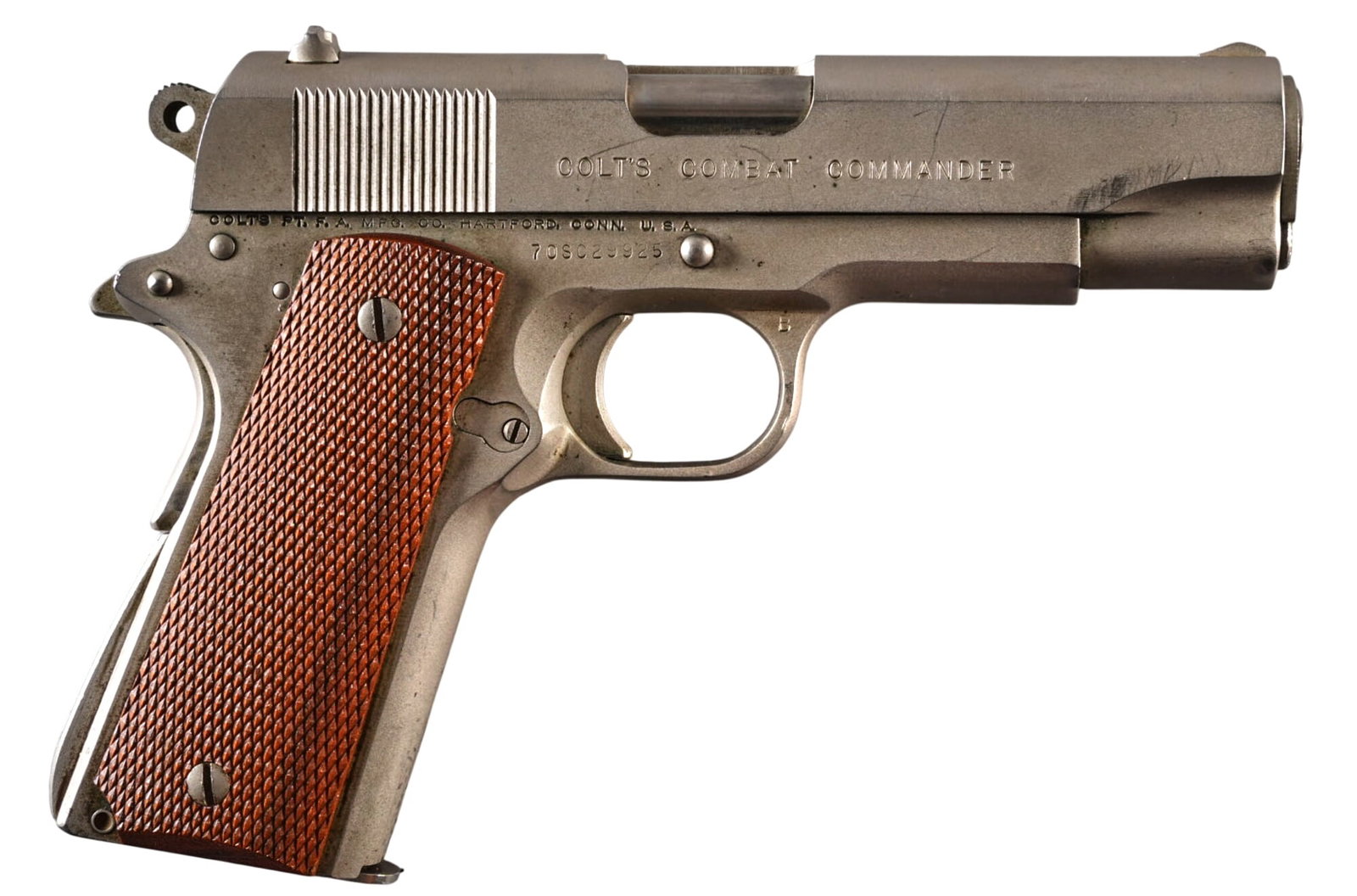 Satin Nickel Colt Combat Commander 45 ACP Semi Auto Pistol W/ Holster: Serial: 70SC29925 Manufacturer: Colt's PT. F.A. Mfg. Co. (c. 1974) Model: Series 70 Combat Commander Caliber: 45 ACP Barrel Length: 4.25 in. OAL: 8 in. Condition: Good; moderately used; fair