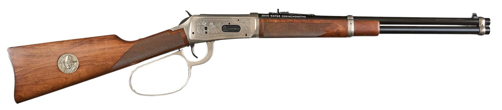Winchester Model 94 32-40 John Wayne Commemorative Lever Action Carbine: Serial: JW22432 Manufacturer: Winchester Model: 94 John Wayne Commemorative Caliber: 32-40 Barrel Length: 18 in. OAL: 36.5 in. Condition: Good-Very Good; some very light wear & handling marks; ver
