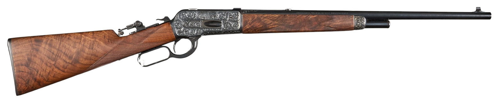 Terry Theis Master Engraved Winchester 1886 Extra Light 45-70 Gov't Rifle: Serial: 00ESLR2305 Manufacturer: Miroku-Japan / Winchester Model: 1886 Extra Light Caliber: 45-70 Gov't Barrel Length: 22 in. OAL: 41 in. Condition: Good-very good; some light handling marks &