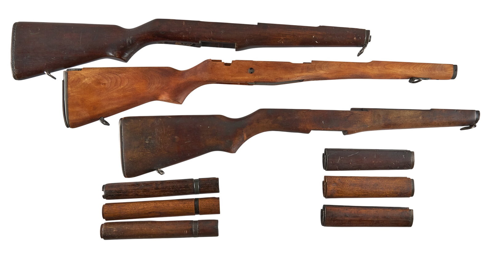 Collection of US M1 Stocks-Parts-Hardware: Includes: -1 x new M1A stock complete w/ hardware/parts; wood is unsealed -authentic period M1 Garand stock & handguards w/ most parts; used/worn condition -authentic period M1 Garand stock & 