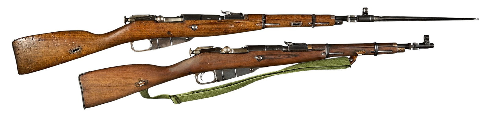 Pair of Chinese Type 53 Mosin Nagant Carbines: Serial: (1) 3190127; (2) 1302038 Manufacturer: Factory 26-China; (1) c. 1955, (2) c. 1954 Model: Type 53 Caliber: 7.62x54R Barrel length: 20 in. OAL: 40 in. Condition: (1) Good-refinished; moderate we
