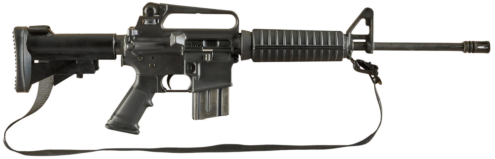 Pre-Ban Colt Sporter Lightweight 5.56 NATO Semi Auto Rifle: Serial: SL015857 Manufacturer: Colt's Mfg. Co. Inc. (c. 1992) Model: Sporter Lightweight Caliber: 5.56 NATO Barrel length: 17.5 in. w/ flash hider OAL: 32.25-35.5 in. Condition: Good; light-modera