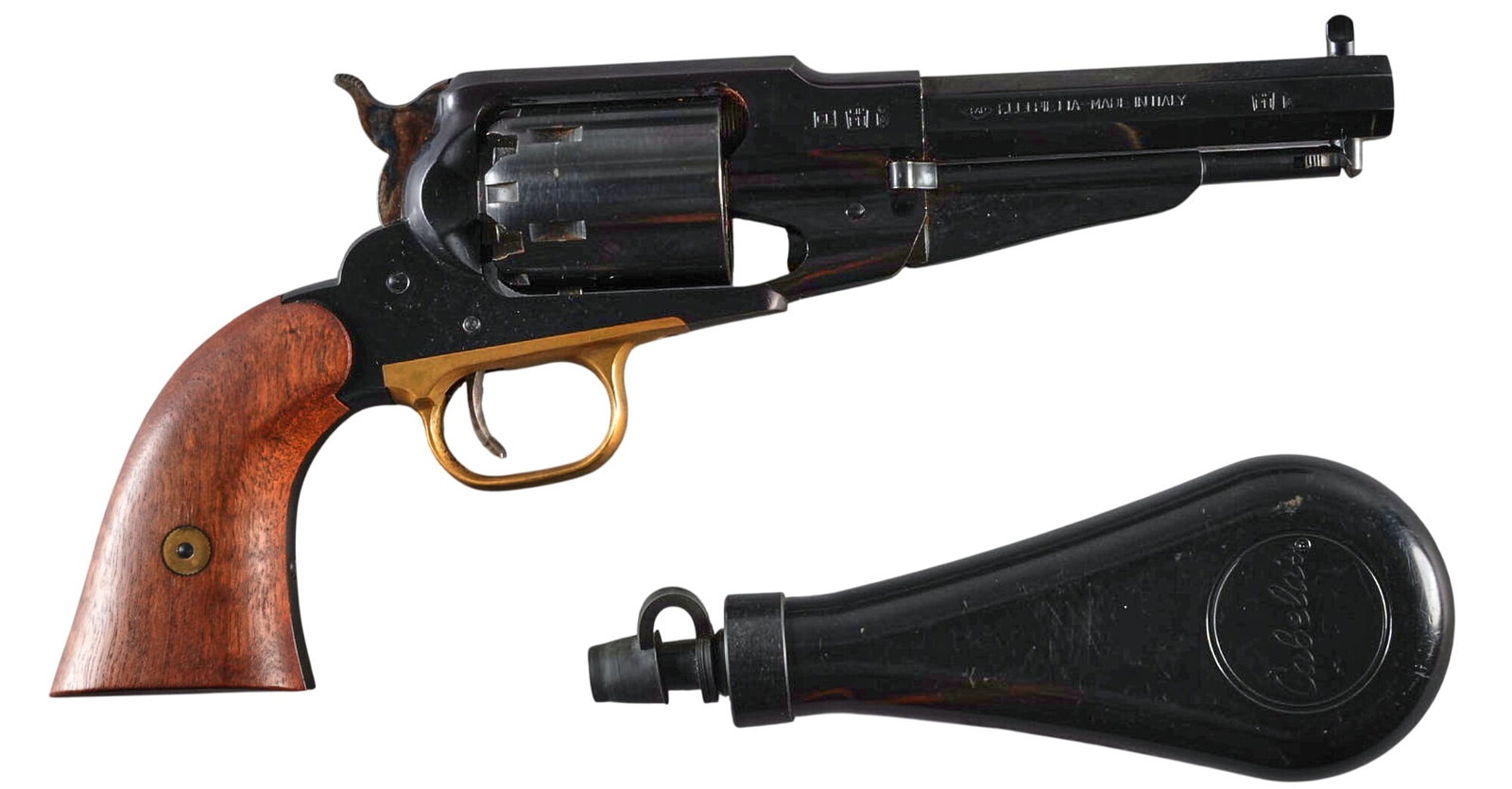 Pietta 1858 Remington Sheriff Model 44 Cal. Percussion Revolver W/ Flask: Serial: R433780 Manufacturer: Pietta-Italy Model: 1858 Remington Sherrif Caliber: 44 cal. Barrel length: 5.5 in. OAL: 11.25 in. Condition: Good; lightwear/handling marks; bore is mostly bright w/ rust