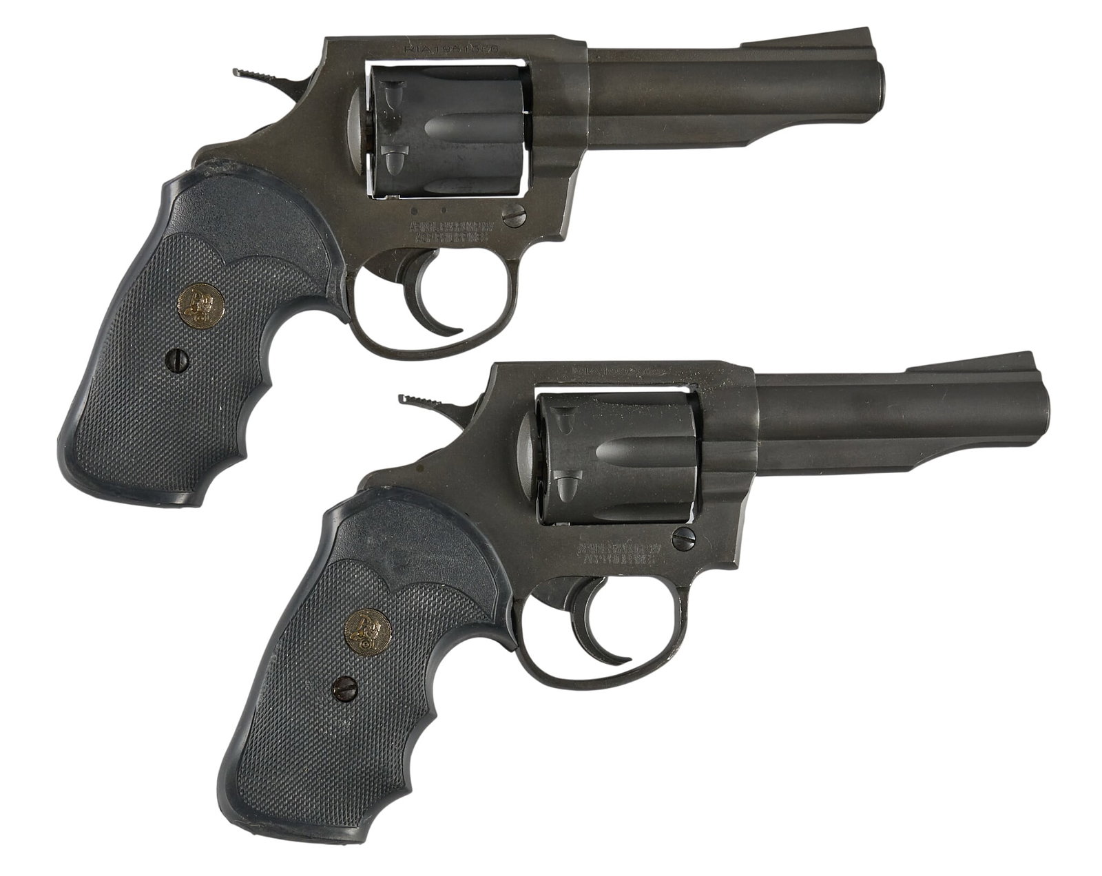 Pair of Rock Island Armory M200 38 Spl Revolvers W/ Holsters: Serial: (1) RIA1951556; (2) RIA1892933 Manufacturer: Apintl-Pahrump-Philippines / Rock Island Armory Model: M200 Caliber: 38 Spl Barrel length: 4 in. OAL: 9 in. Condition: Good; moderately u