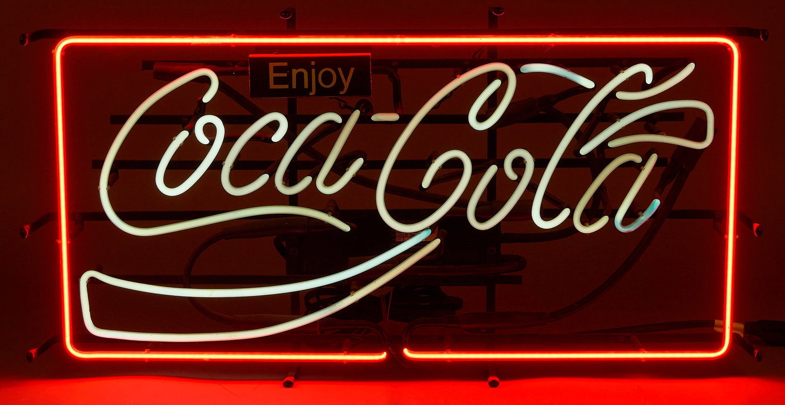 Coca-Cola Neon Sign: Coca-Cola neon sign, in working order height 15 in. x width 28 in. x depth 5 in. Provenance: Property from a home in San Antonio, Texas