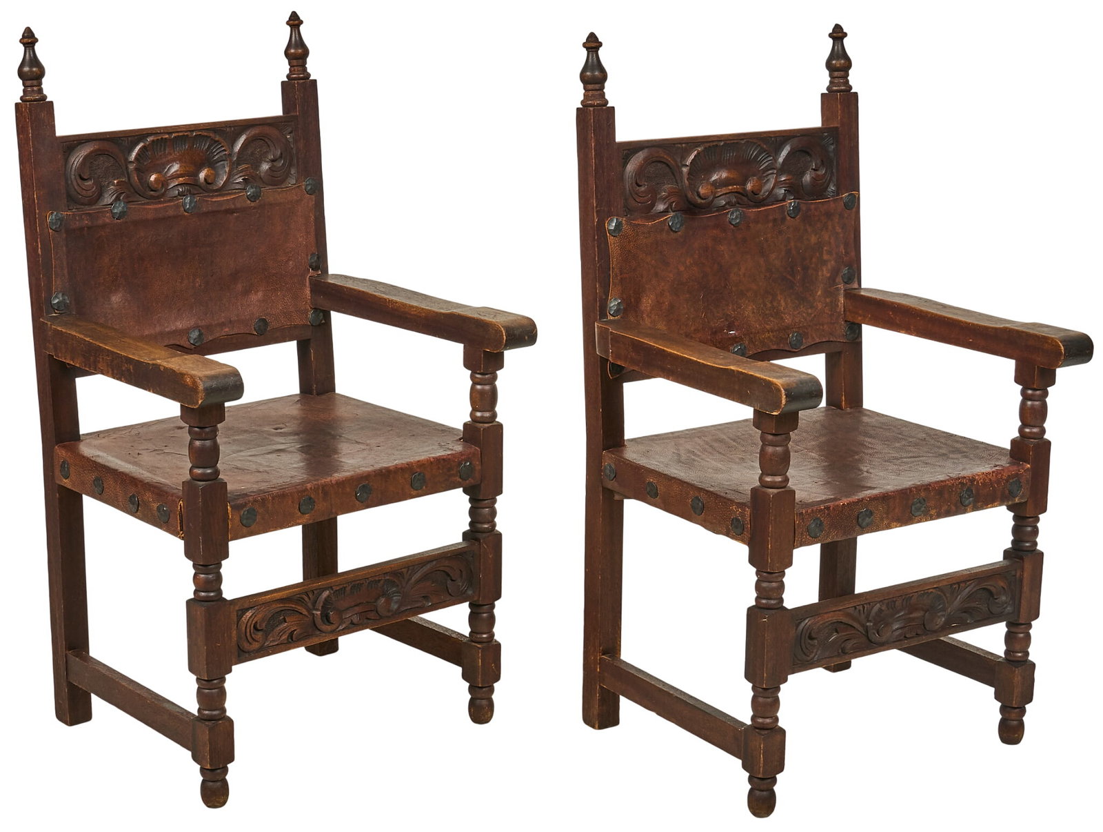 Pair of Hacienda Style Chairs: Pair of hacienda style chairs with carved back panel and turned front legs height 43 in. x width 24 in. x depth 22 in. / each Provenance: Property from a San Antonio, Texas