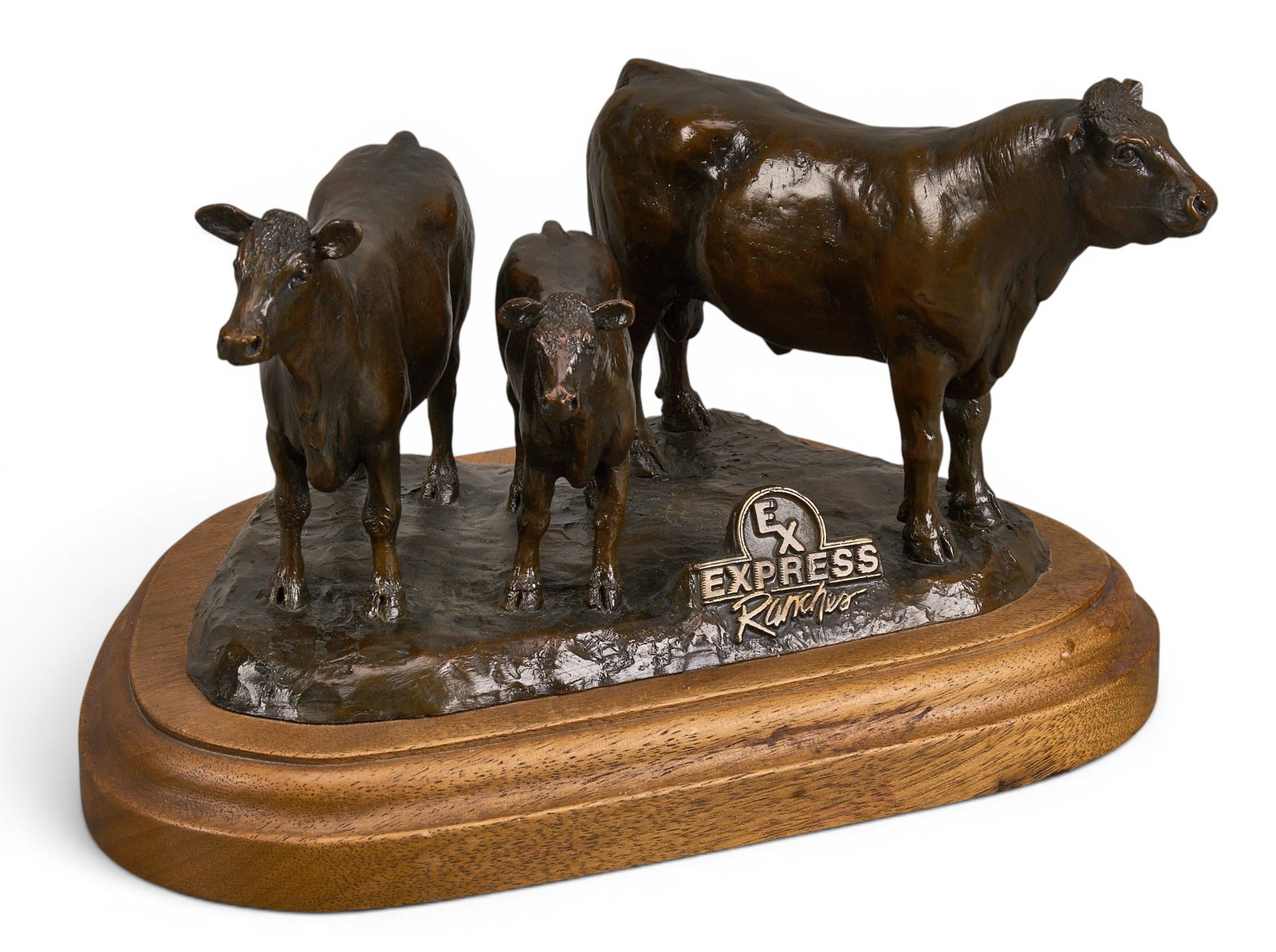 Express Ranches Cow Family: Express Ranches cattle family, artist-cast bronze sculpture on wooden base, appears not marked or signed; resembles James Linthicum's work height 6 in. x width 11 in. x depth 7.5 in.