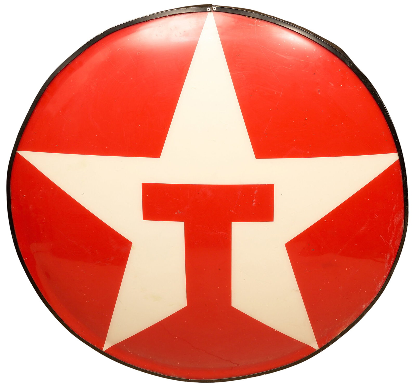 1960s Texaco Sign: Texaco gasoline service station sign face, domed form, circular with iconic red star and "T" logo, white translucent field with black metal rim, circa 1960s - 1980s diameter 33 in. 