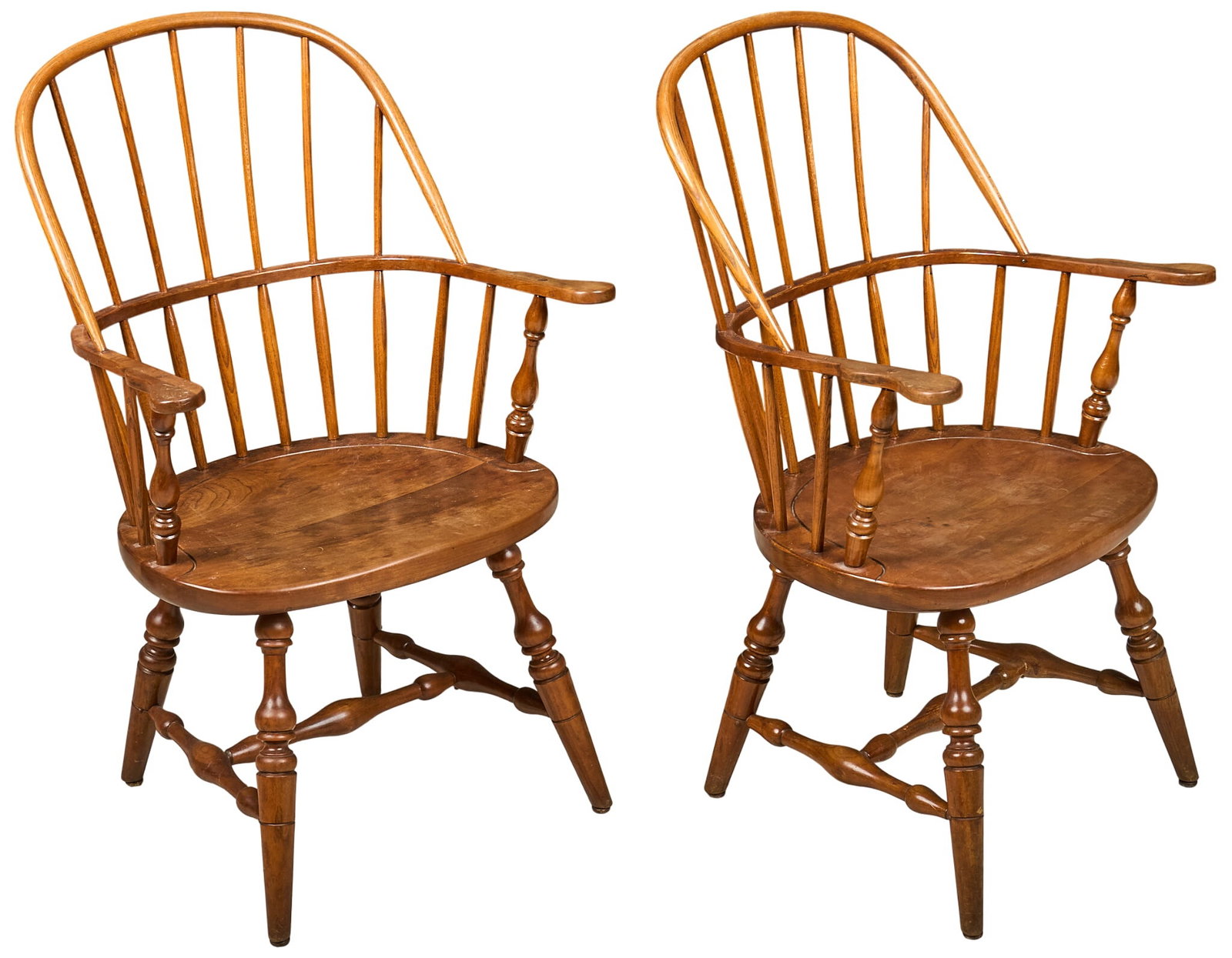 Pair of Stickley Chairs: Pair of Stickley wooden chairs, supported on turned legs, marked under seat height 38 in x width 25 in. x depth 18 in. / each Provenance: Property from a home in San Antonio,