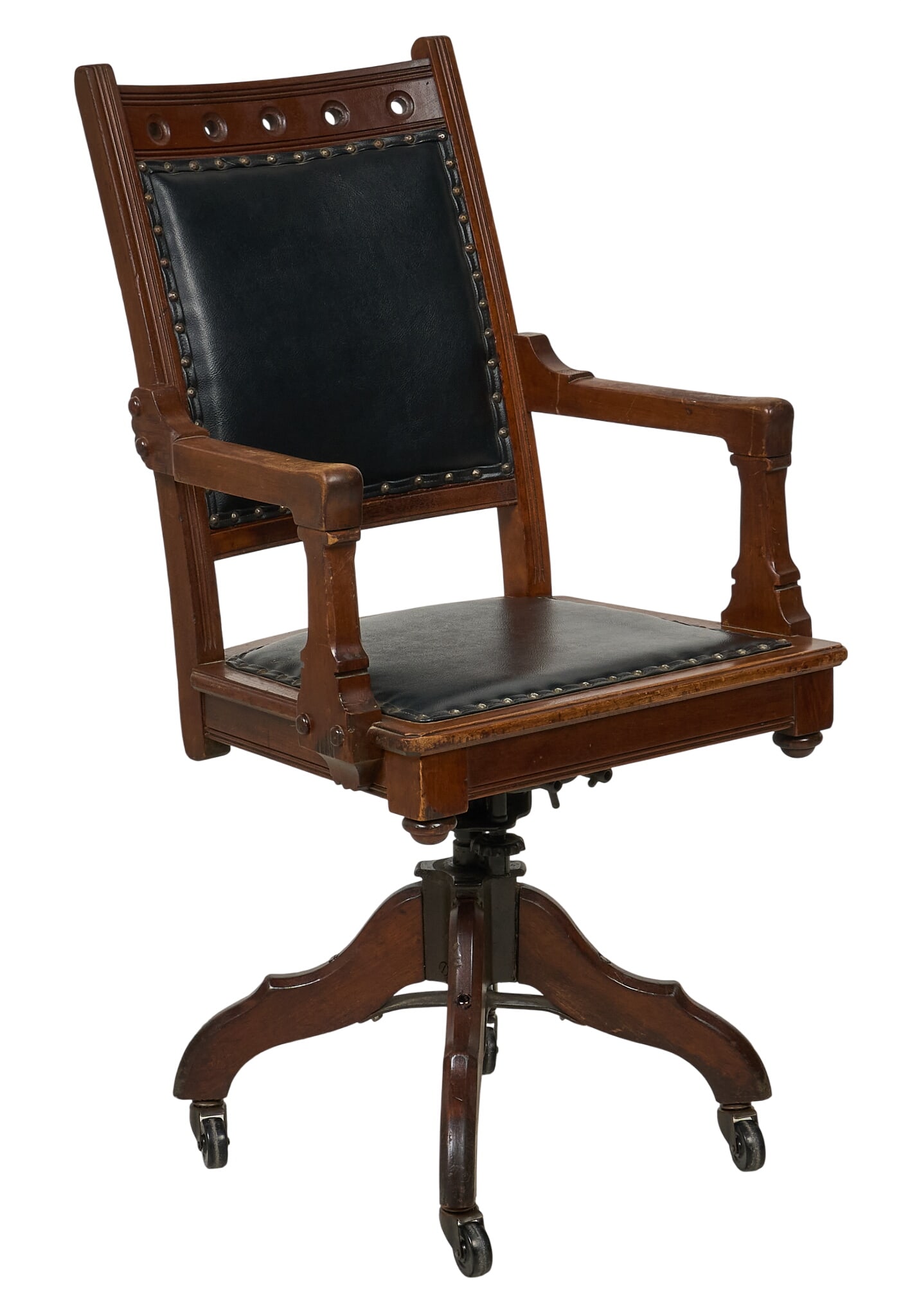 Early American Office Chair: Early American office chair with leather seating, and swivel base supported on casters, circa early 20th century height 52.5 in. x width 16.5 in. x depth 26 in. Provenance: Property from