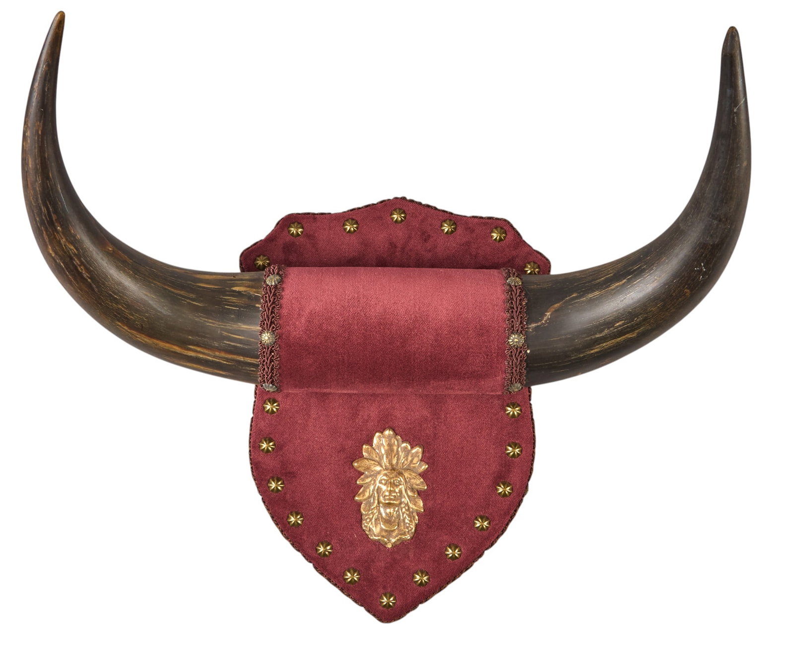 Buffalo Horns Wall Mount: Period late 19th century buffalo horns wall mount on red velvet upholstered plaque with Native American emblem height 8 1/2 in. x width 15 in. x depth 11 in. Provenance: Property from