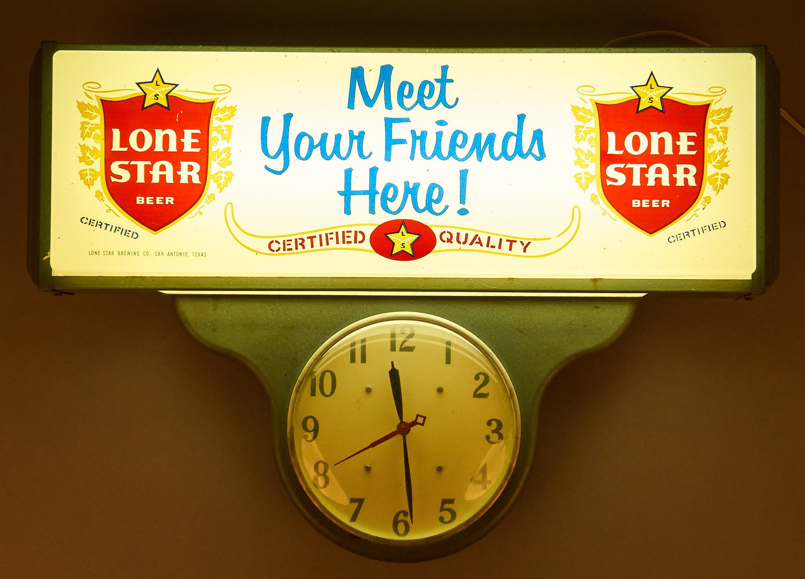 1960s Lone Star Beer Clock & Light: 1960s Lone Star Beer clock and light, in working condition height 19 in. x width 27 in. x depth 5.5 in. Provenance: Property from a home in San Antonio, Texas 