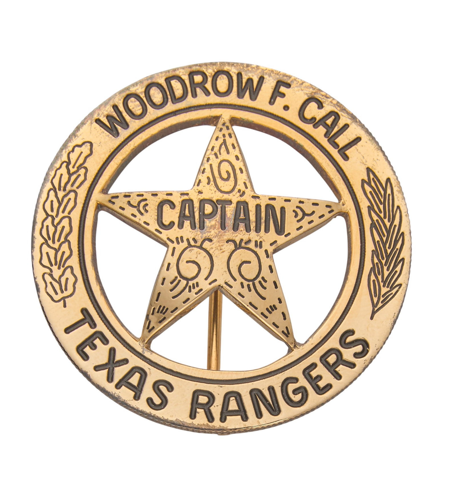 Woodrow F. Call Texas Rangers Captain's Badge: Woodrow F. Call Texas Rangers Captain's badge made by the Lopez Brothers, the official Texas Rangers badge makers, from a Mexican cinco peso coin, plated in 22K gold (customary for Captains'