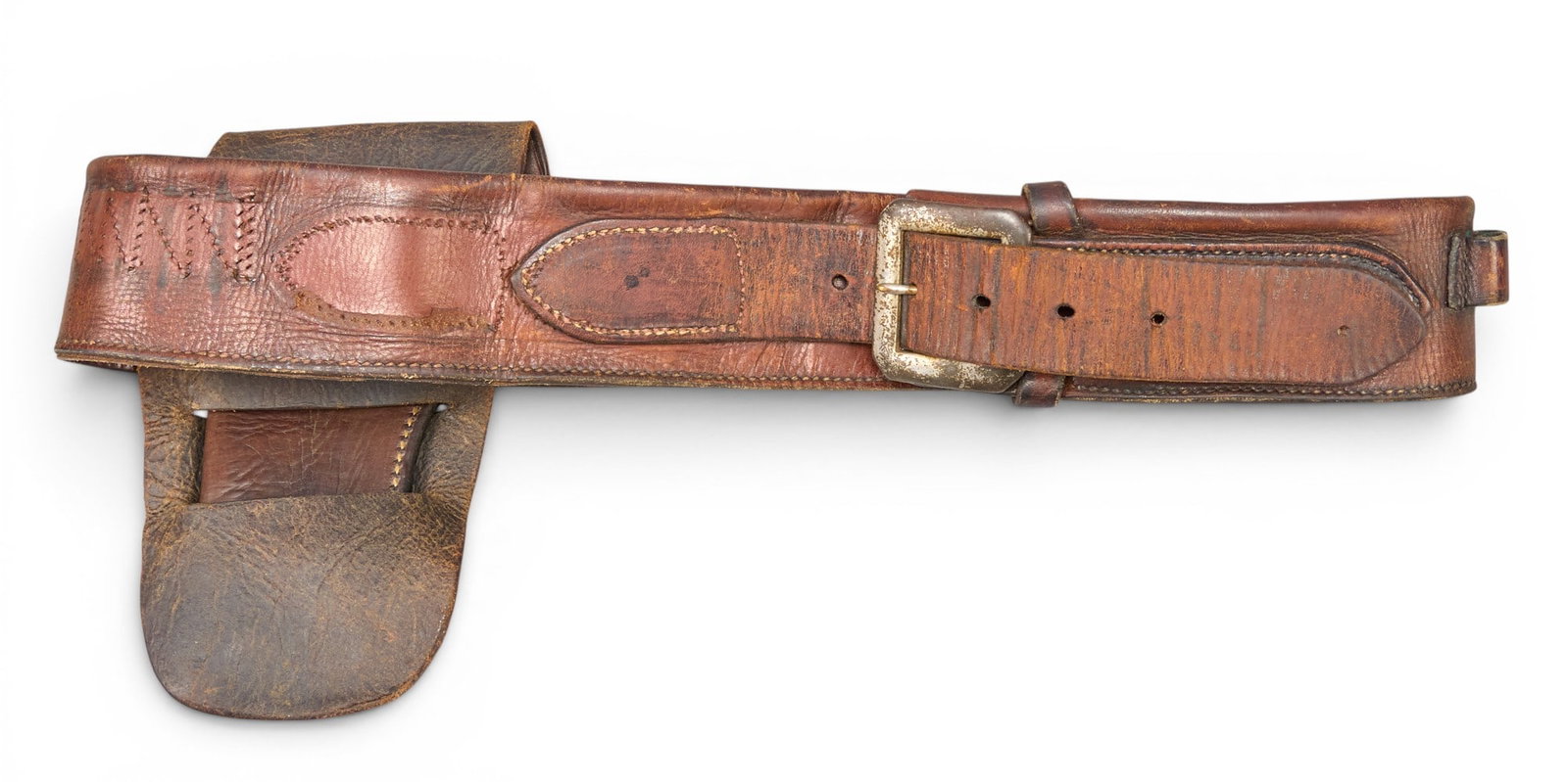 S.D. Meyers Money Belt and Holster: Leather money belt by S.D. Meyers (El Paso, Texas) and single-action holster by "Kings" (El Paso, Texas) Provenance: Property from a home in Bandera, Texas 45 x 2.5 