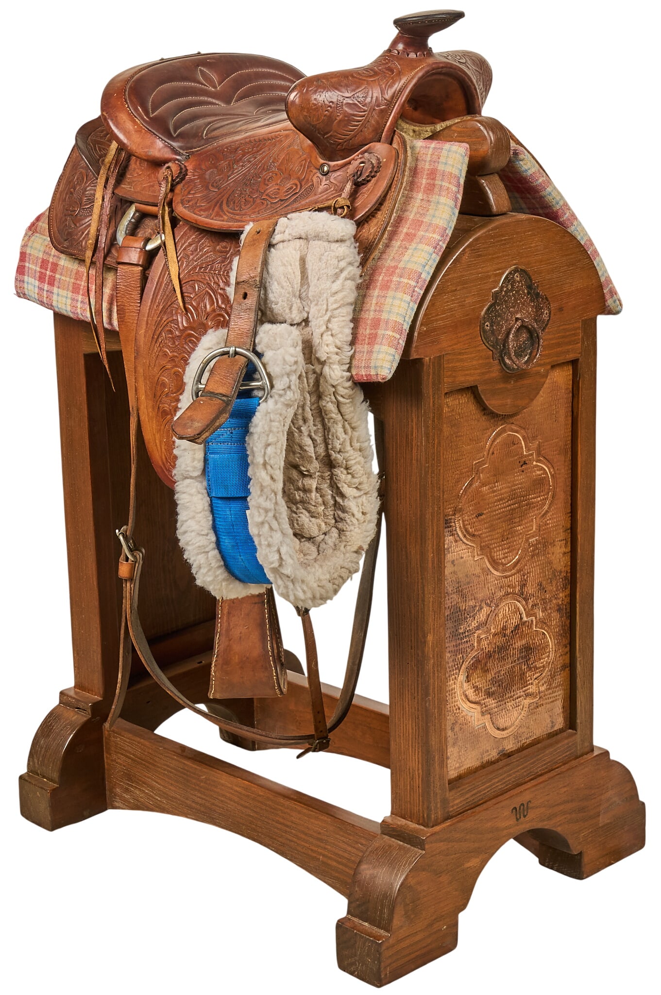 Custom-Made Ladies Saddle: Custom-made ladies saddle with tooled leather design, wool-lined strap, gingham saddle blanket, and name plate "Rita Stich", made by the Carvajal family in the 1970s, used for ranch wor