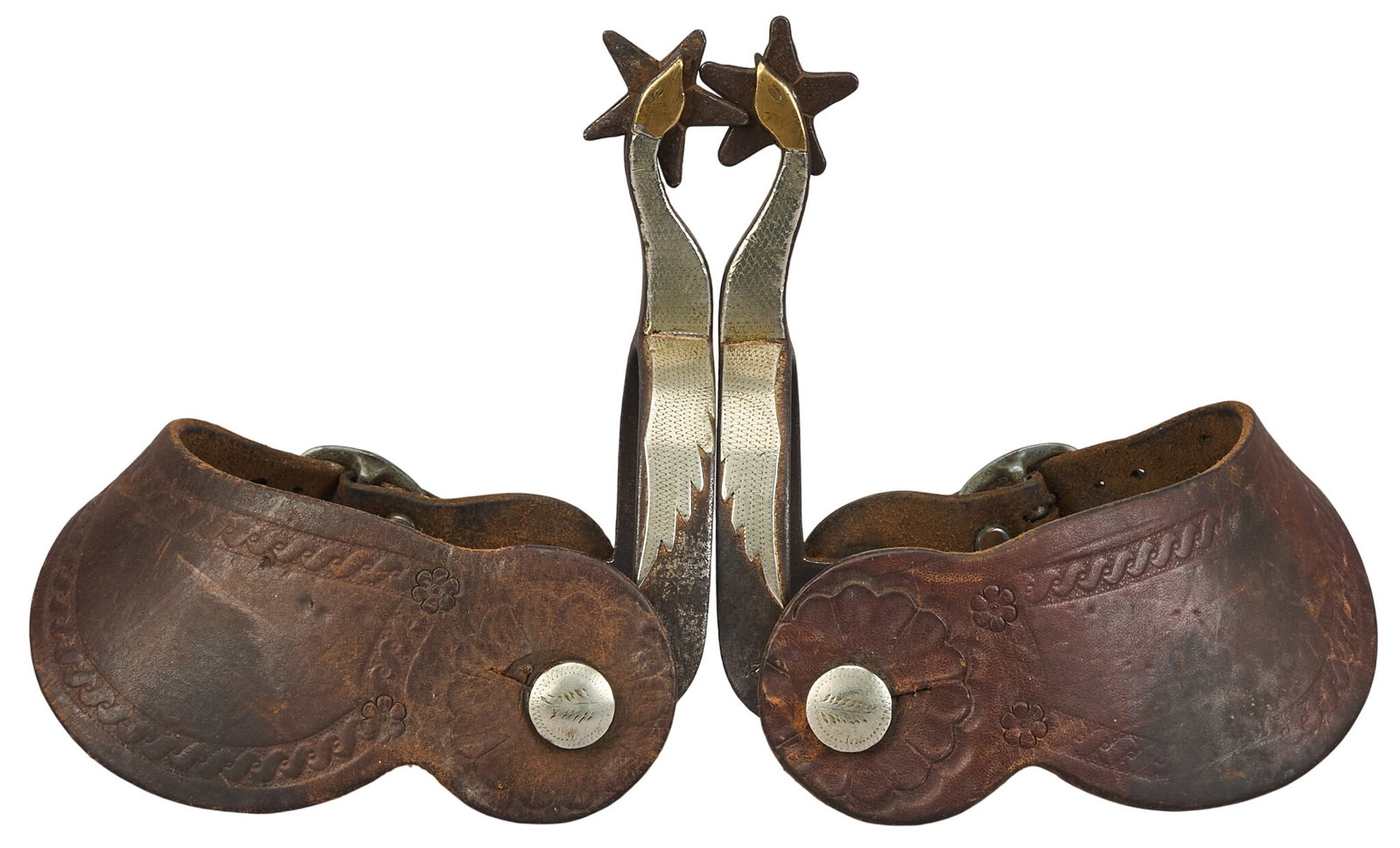 Pair of Kelly Bros. Flying Gooseneck Spurs: Pair of Kelly Bros. flying gooseneck pattern cowboy spurs, leather heel strap with flower motifs, marked on heel band near button overall length: 6 in. heel width: 3.5 in rowel diameter: 1.25 in