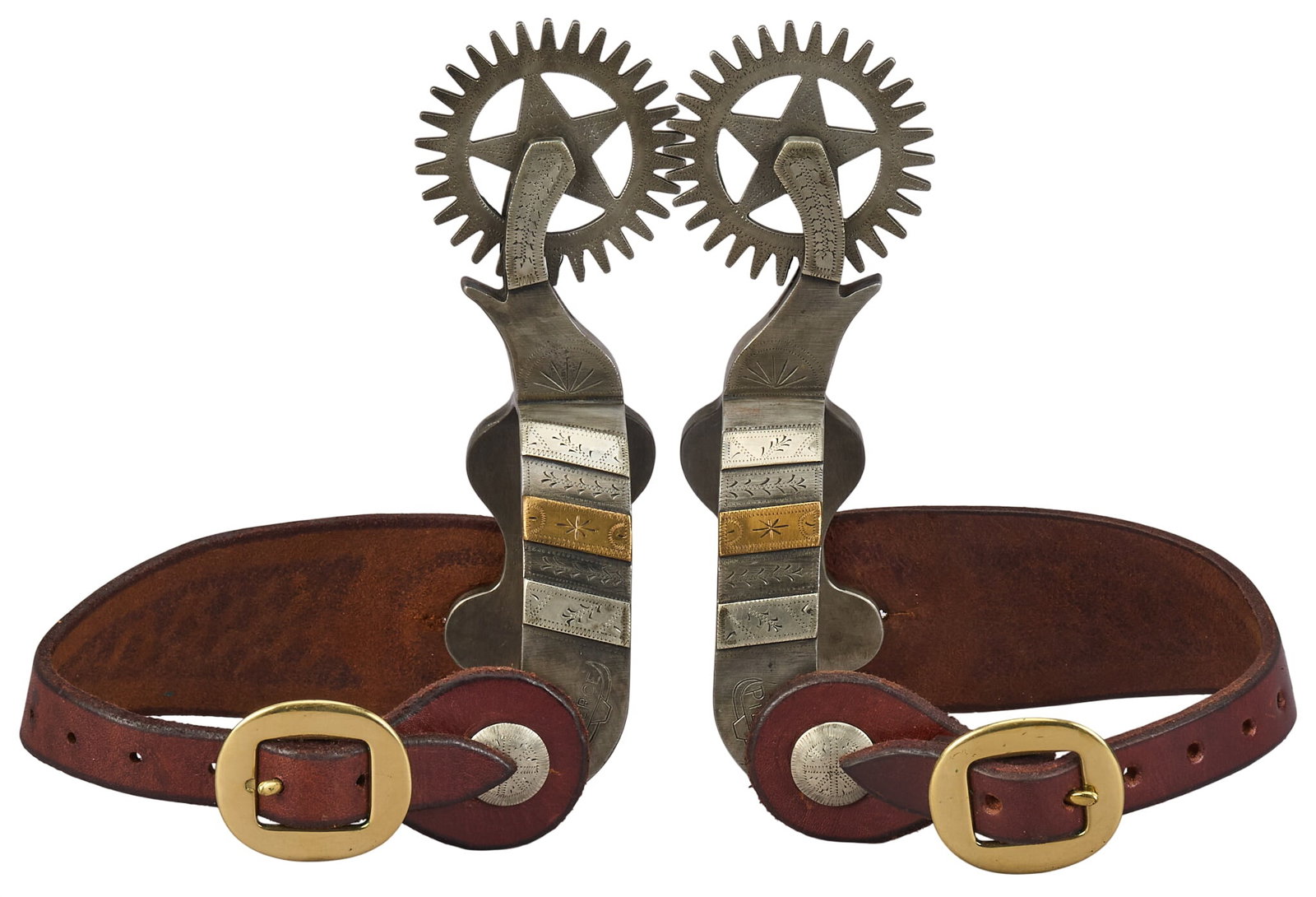 Pair of Don Pierce Longhorn Pattern Spurs: Pair of Don Pierce maker made longhorn pattern spurs with cut-out star of Texas rowels, tooled leather heel straps, and silver overlay overall length: 7 in. heel width: 3.25 in. rowel diameter: 