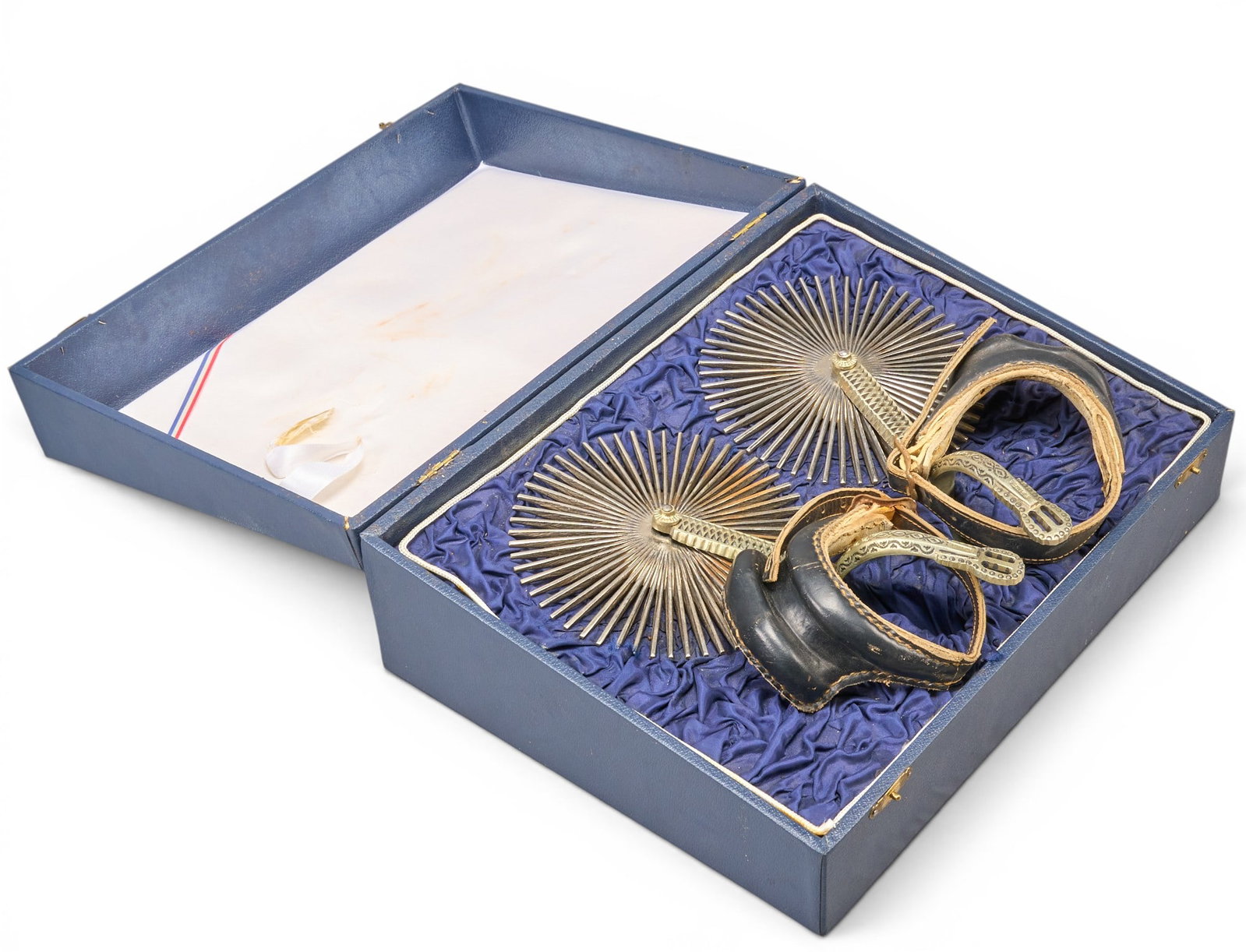 Pair of South American Presentation Gaucho Spurs with Case: Pair of South American presentation gaucho spurs with jumbo rowels, engraved geometric motifs on shanks, and case, marked "Chile" on shanks overall length: 10.5 in heel width: 3 in. ro