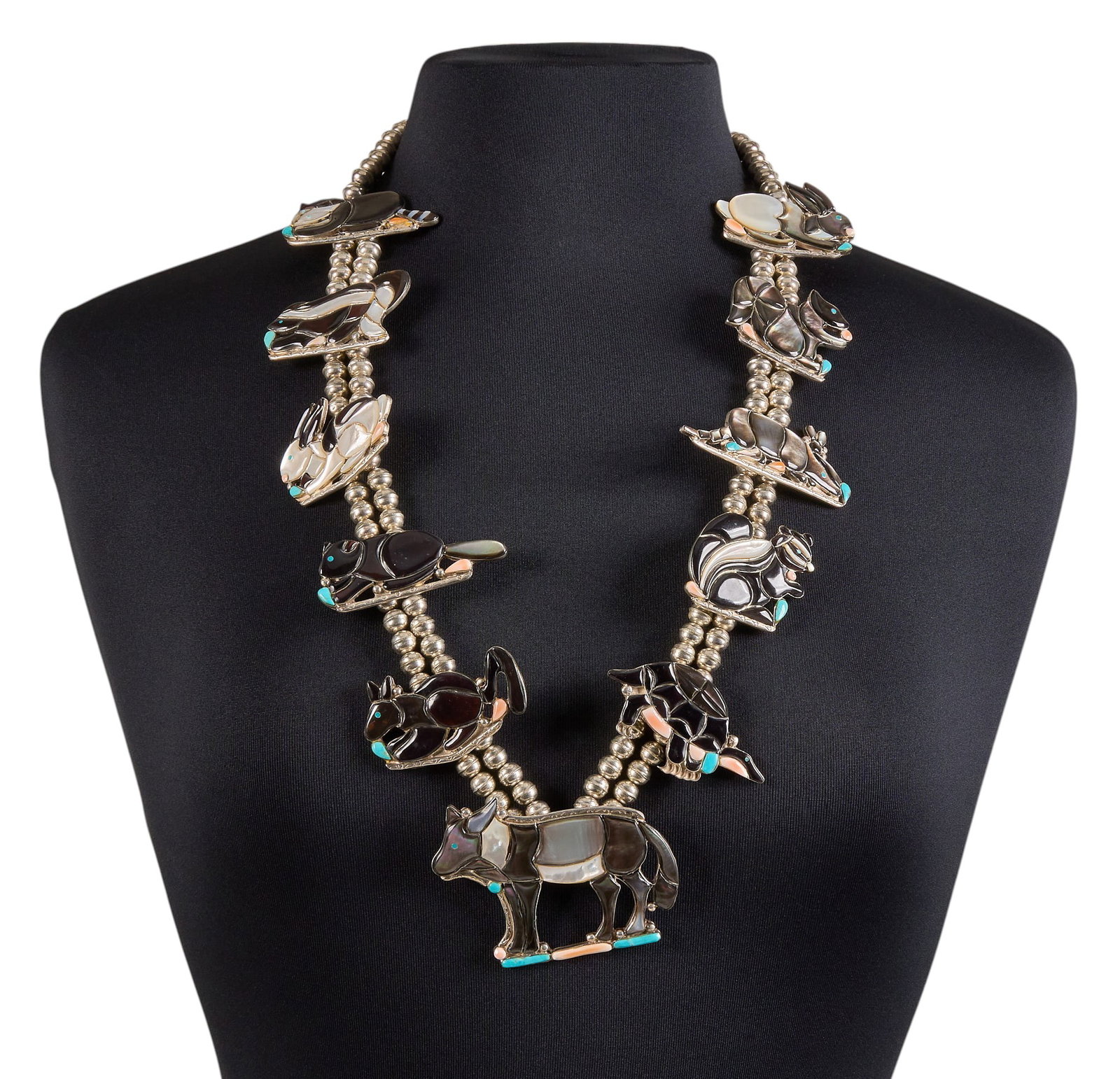 Southwestern Style Multi-Stone Animal Necklace: Southwestern style animal motif necklace, set with various animal motifs, each set with multi-stone inlay, with hook and eye closure Length: 30 in. Total weight: 199.6 g Provenance: Property from