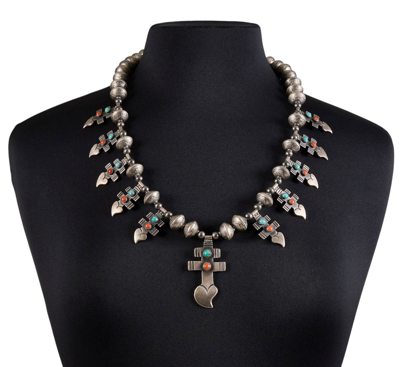 Sterling Silver Turquoise & Coral Dime Necklace: Lawrence Archuleta, sterling silver pendant necklace set with turquoise and coral cabochons, pendant featuring a cross variant, on string of mercury dime beads, signed "Archuleta Sterling Buffalo