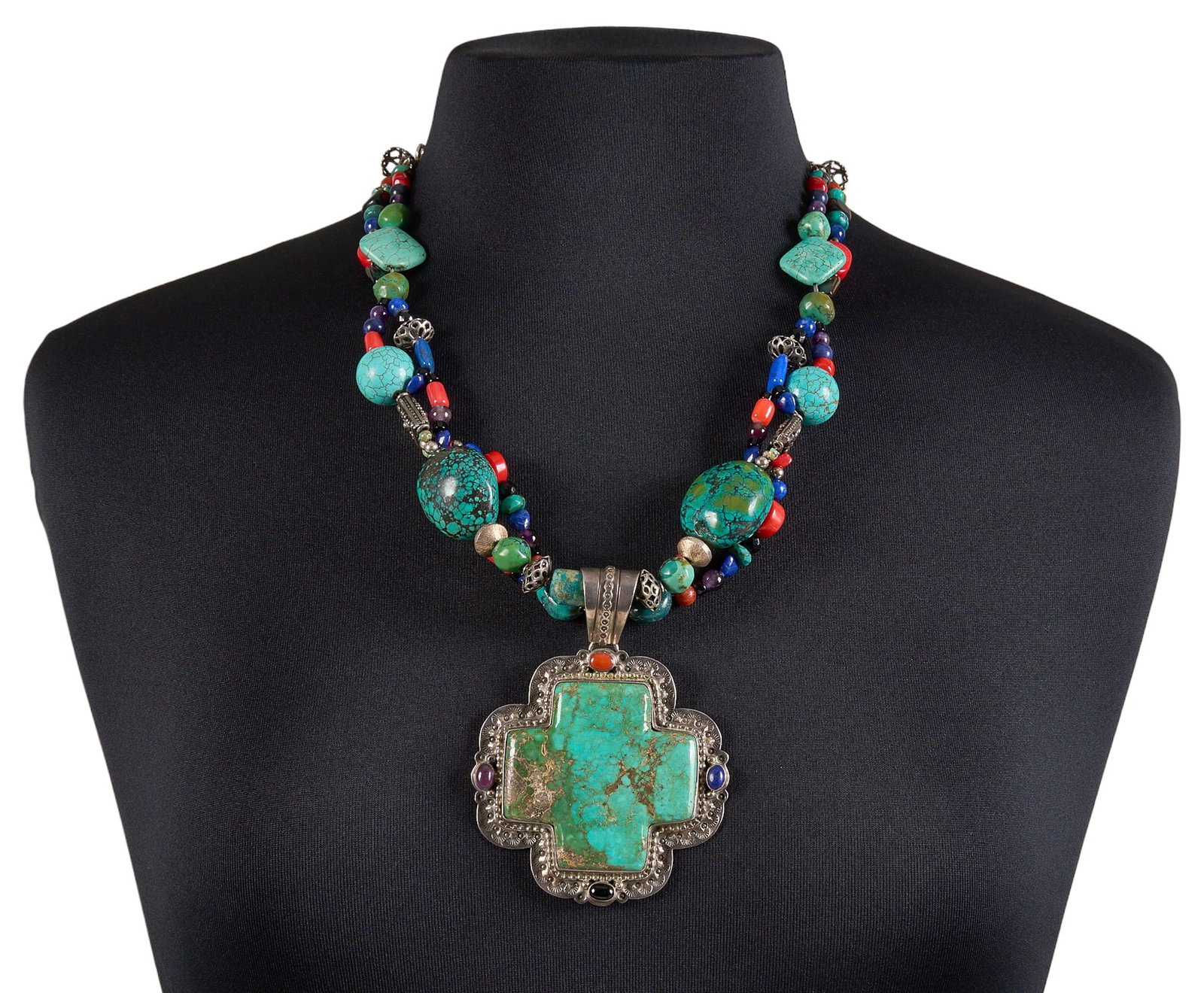 D. Gordon, Navajo Multi-Stone Cross Pendant Necklace: Delbert Gordon, Navajo cross motif pendant necklace, sterling silver pendant set with large turquoise stone, accented by multi-stone cabochons and stamped details, on two-strand multi-stone beade