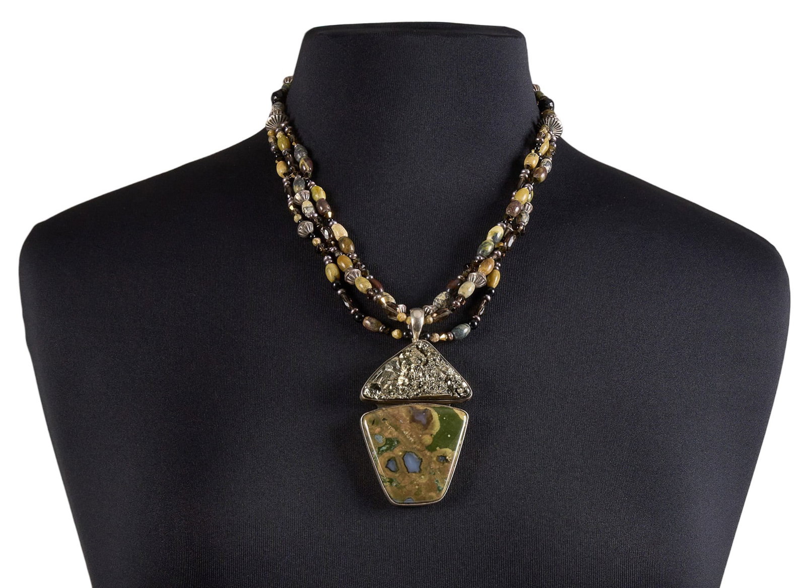 Bobby Johnson, Navajo Beaded Pendant Necklace: Bobby Johnson, Navajo multi-strand beaded necklace, with sterling silver pendant set with hardstone, signed "B. Johnson Sterling" Length: 22 in. Total weight: 112.1 g Provenance: Proper