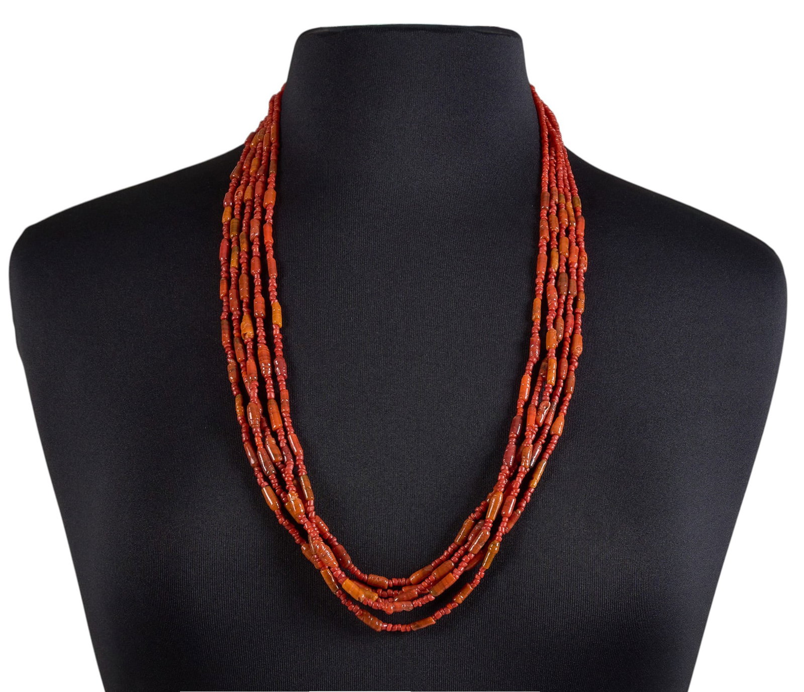Multi-Strand Beaded Coral Necklace: Multi-strand beaded coral necklace, composed of five strands, with hook and eye closure Length: 30 in. Total weight: 60.6 g Provenance: Property from an Austin, Texas estate
