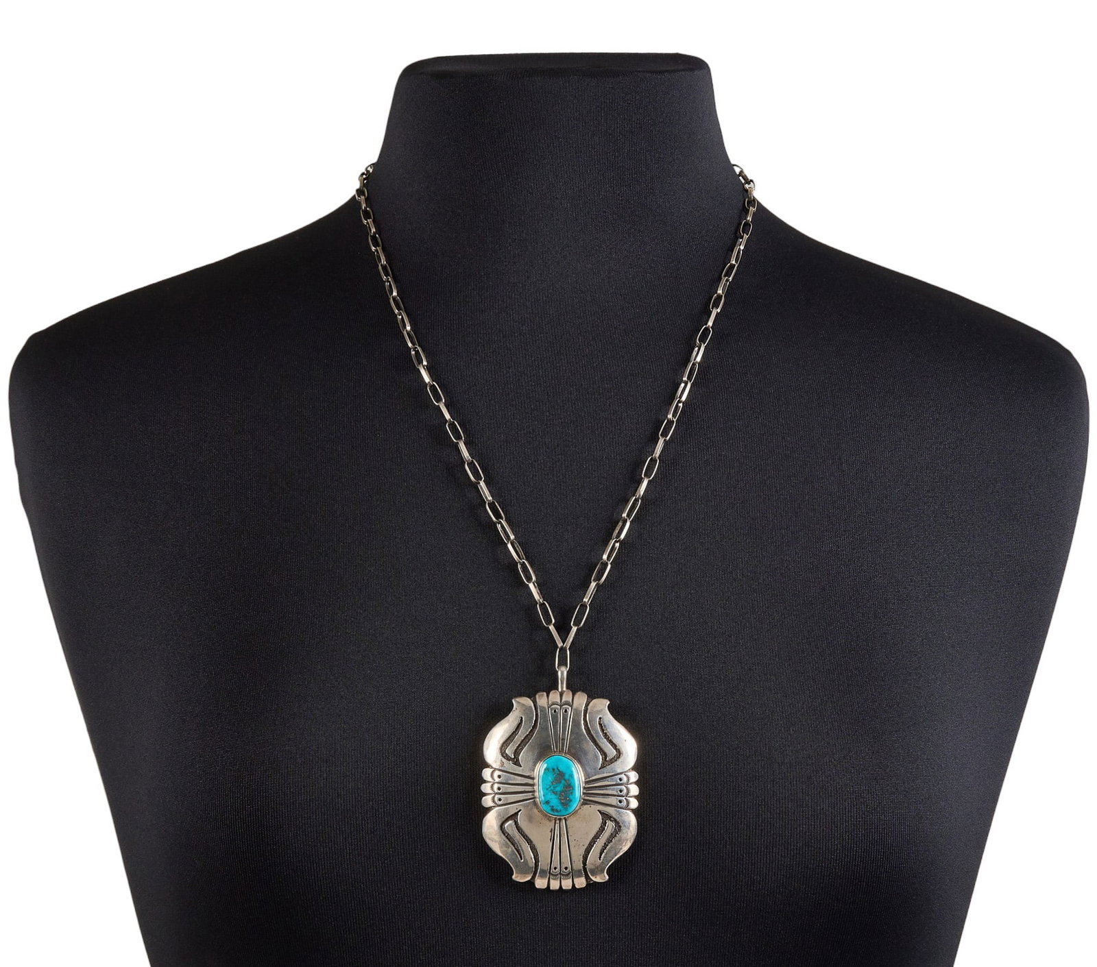 Thomas Singer, Navajo Sterling & Turquoise Pendant Necklace: Thomas Singer, Navajo sterling silver pendant set with turquoise cabochon and stamped details, signed "Thomas Singer", on old Navajo chain Length: 24 in. Total weight: 42.8 g 