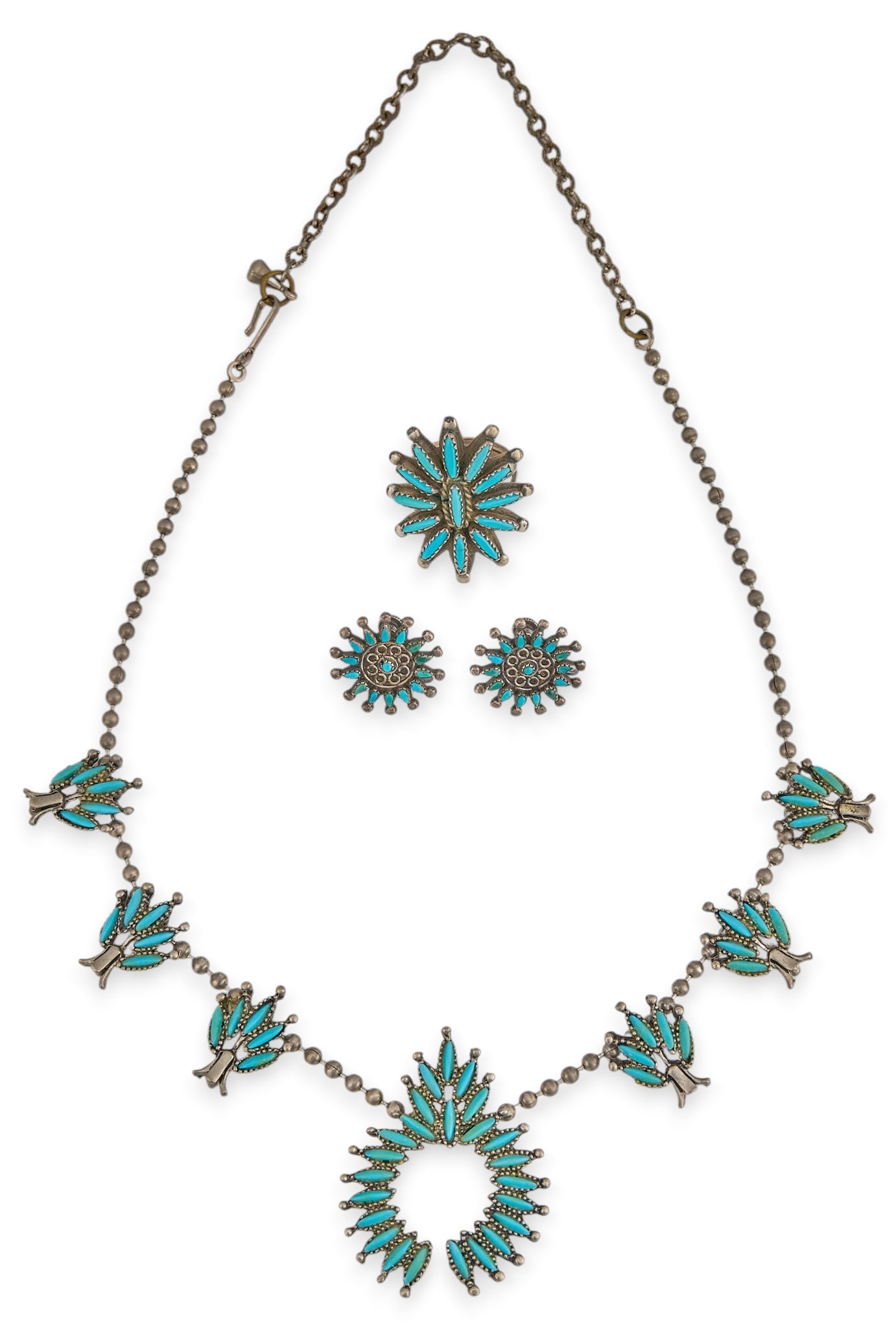 Sterling & Turquoise Petit Point Jewelry Suite: Southwestern sterling silver jewelry suite with squash blossom necklace, pair of earrings, and ring, each set with turquoise cabochons in petit point design, marked "sterling" Length: 15-20 