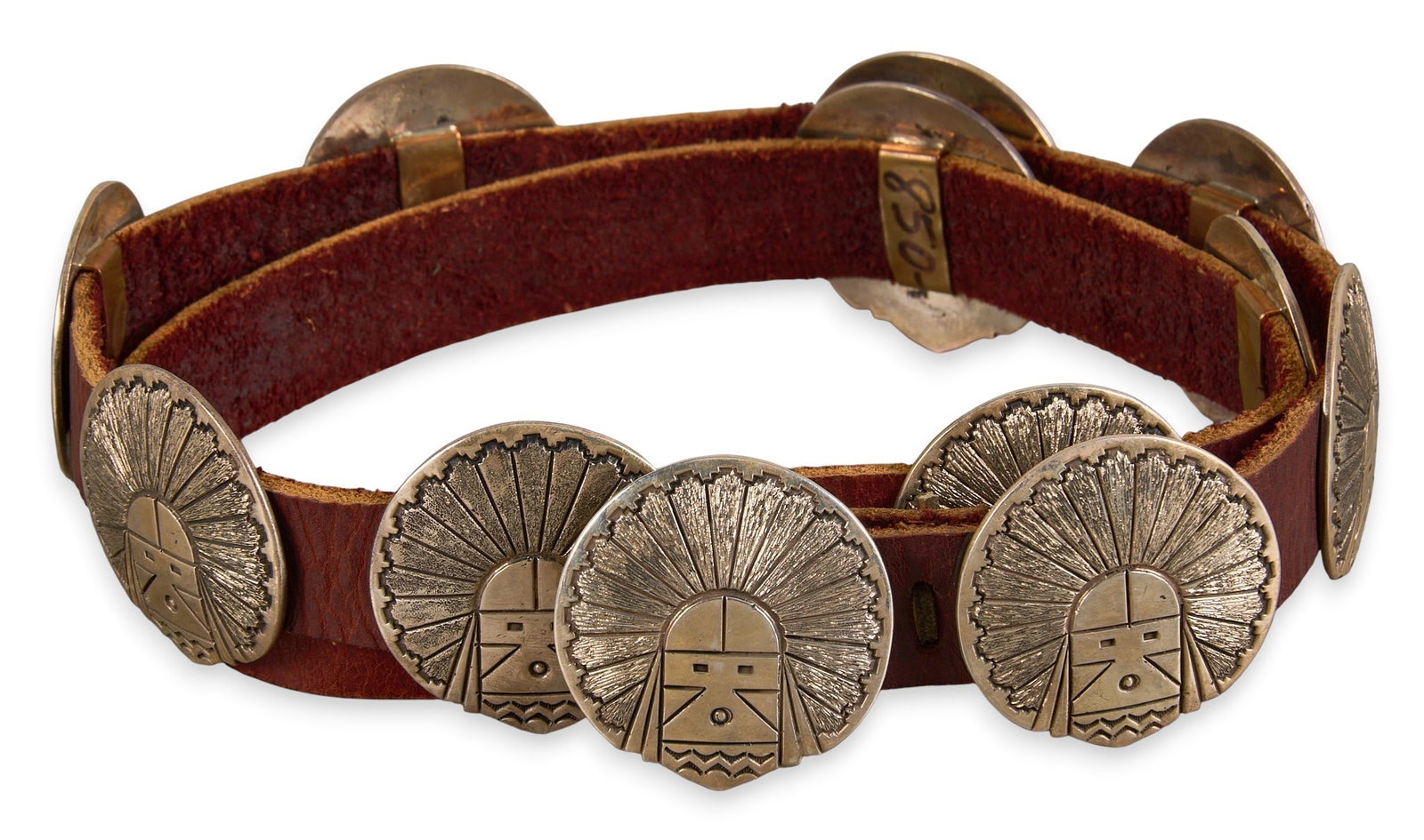 Gary Custer, Navajo Sterling Concho Belt: Gary Custer, Navajo sterling silver concho belt, with eleven conchos and buckle depicting etched figural motifs, on brown leather belt, signed "GSC Sterling" on buckle Length: 43 in. Total w