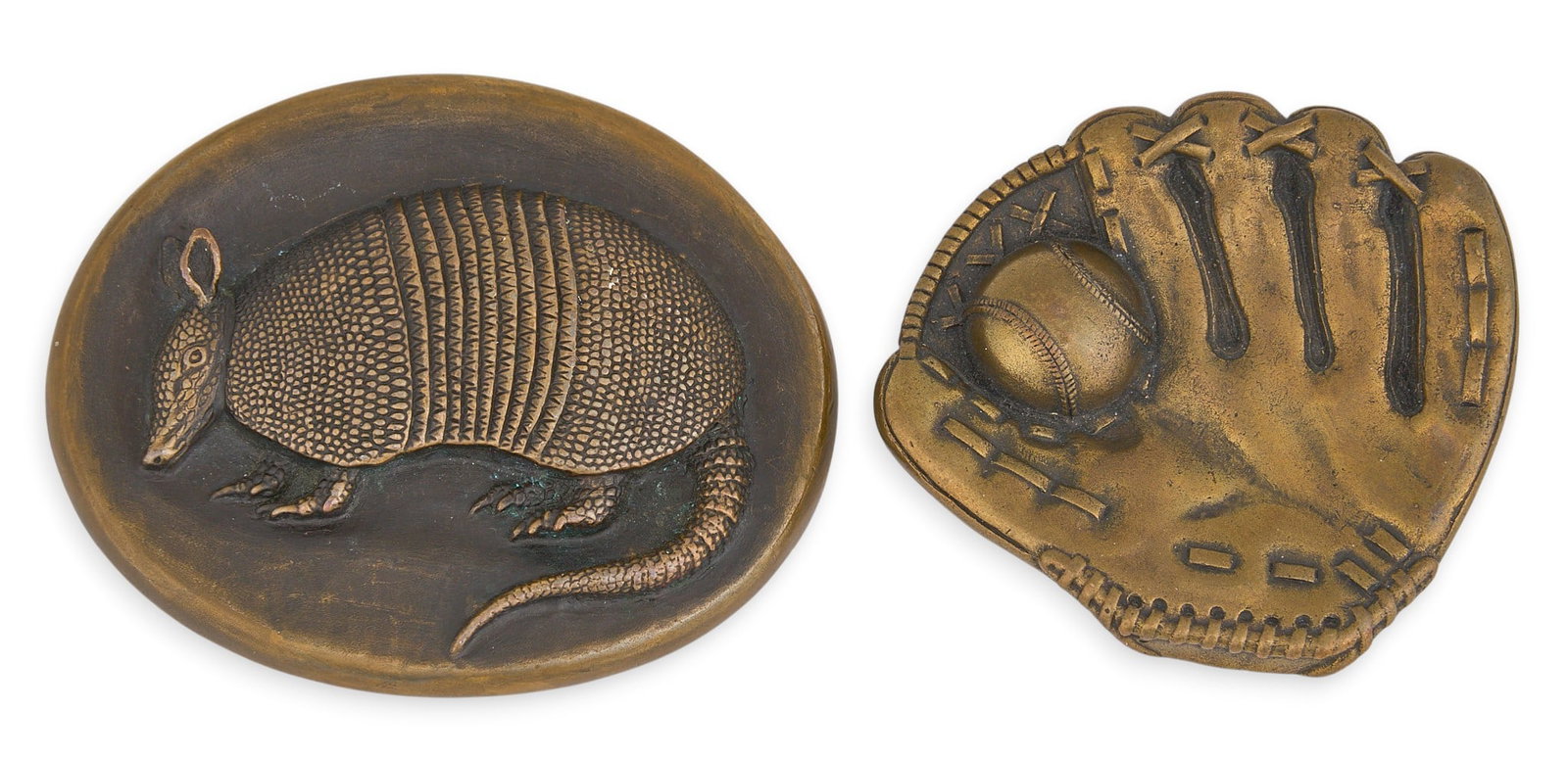 (2) James Avery Bronze Buckles: Two James Avery bronze buckles, depicting an armadillo and baseball glove respectively, both marked "Bronze" with James Avery hallmark Provenance: Property from a San Antonio, Texas antiques