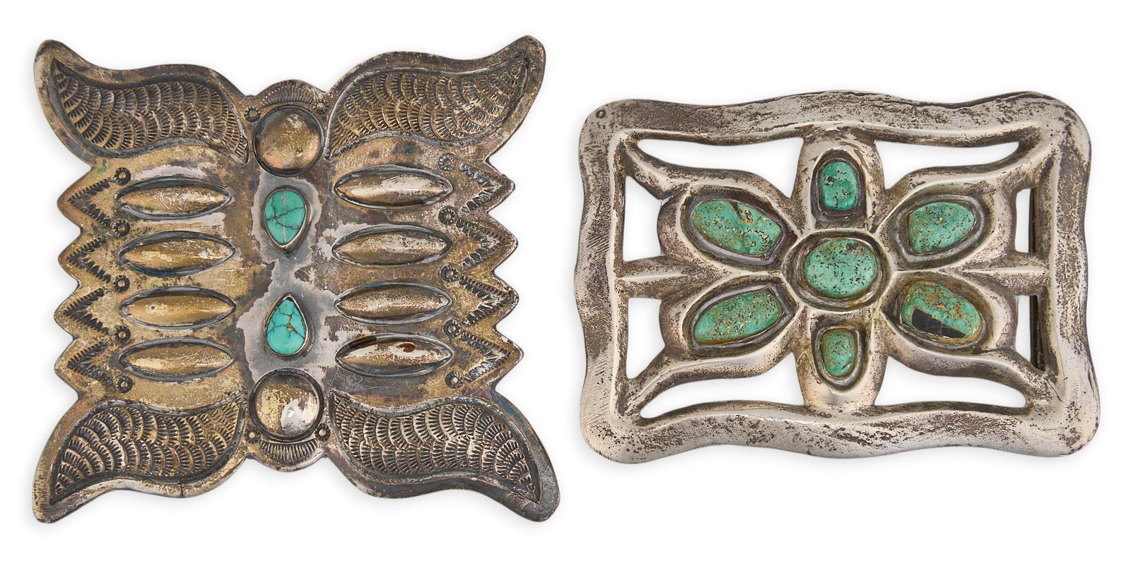 (2) Navajo Sterling & Turquoise Buckles: Two Navajo sterling silver buckles, set with turquoise cabochons and stamped details, one buckle marked "Sterling TC" Size: 3.5 in. x 3.25 in. / largest Total weight: 148.3 g Provenance: Pro