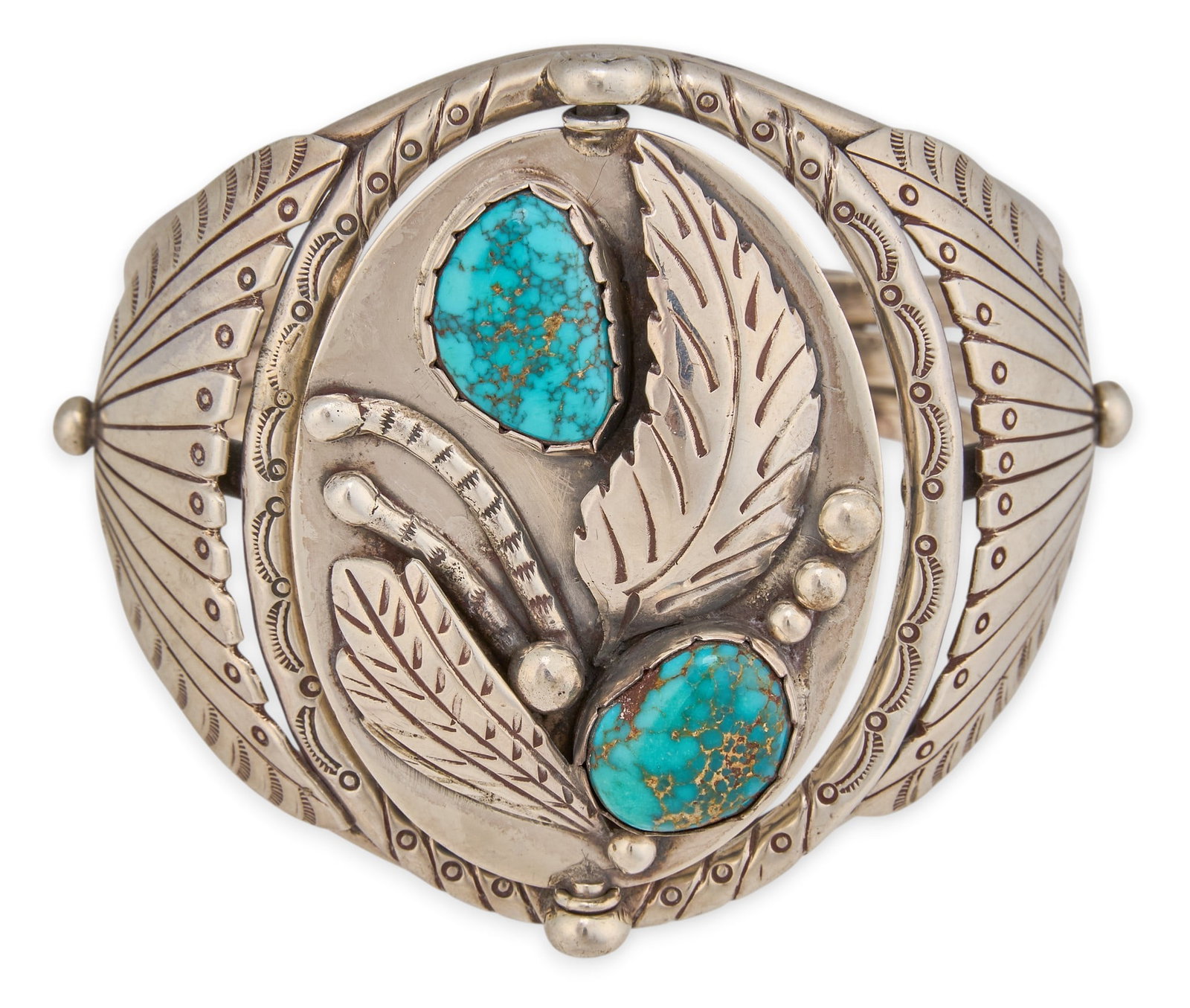 Carl Luthy, Navajo Sterling Silver Reversible Cuff: Carl Luthy, Navajo sterling silver cuff bracelet, reversible design set with turquoise and coral, featuring stamped details and feather motifs throughout, stamped with maker's hallmark Circum