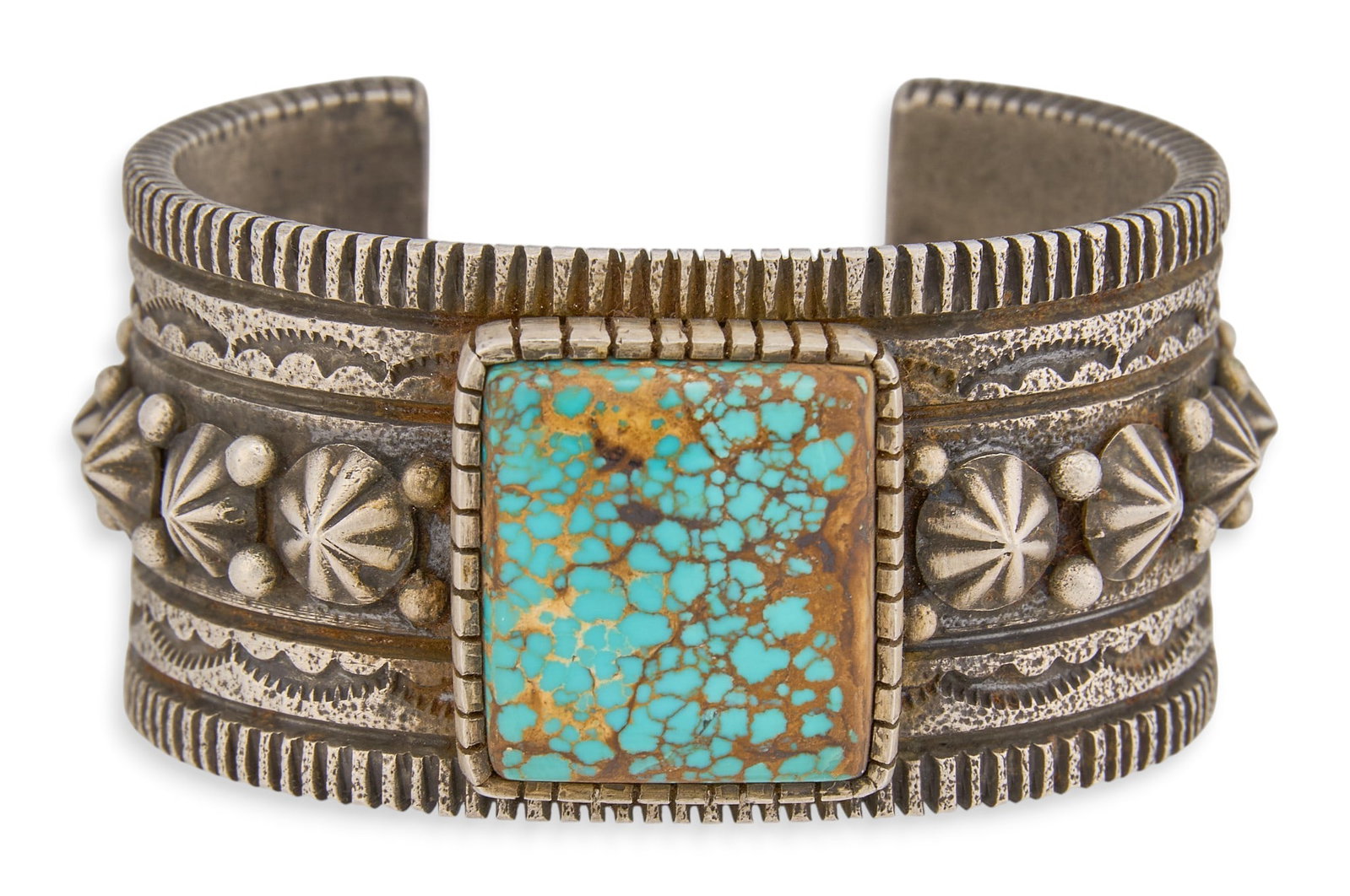 Native American Tufa Sterling & Turquoise Cuff: Native American tufa sterling silver cuff bracelet, set with single square turquoise stone, featuring stamped and ribbed design, signed "NEZ" and marked "Sterling" Circumference: