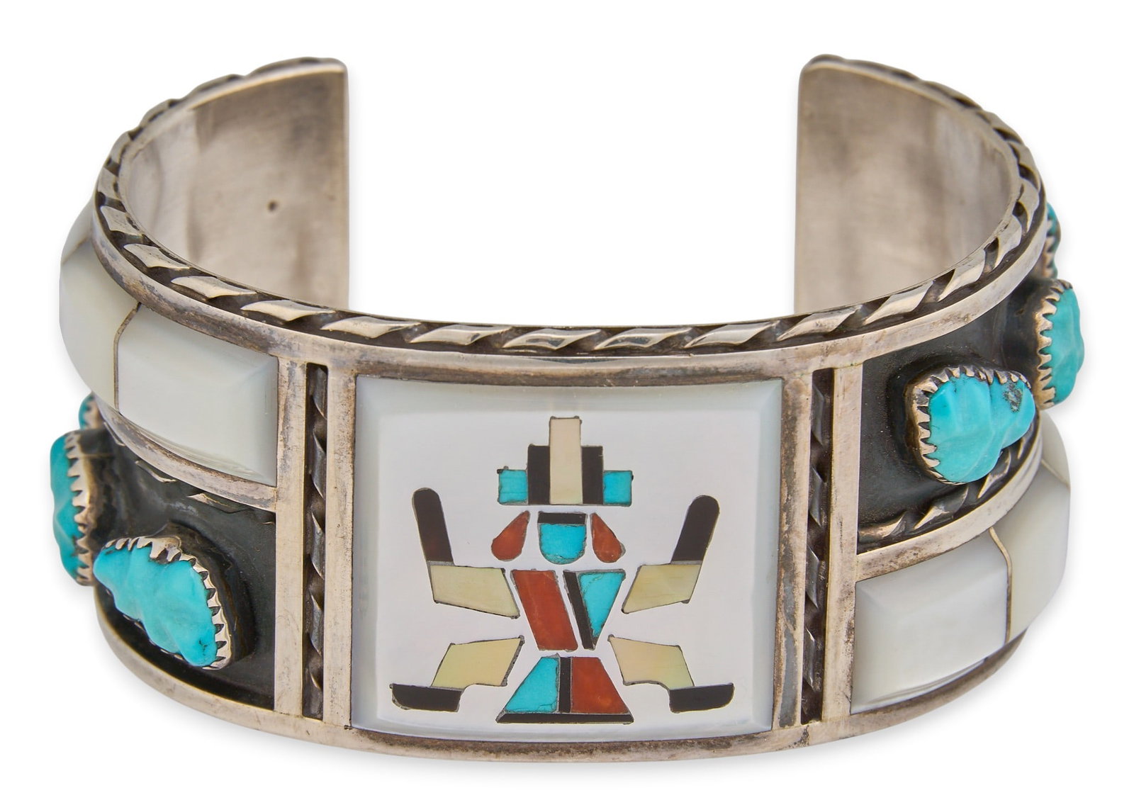 F&L Panteah, Zuni Sterling & Multi-Stone Inlay Cuff: Florentine and Lela Panteah Zuni sterling silver cuff with multi-stone inlay and settings, marked Circumference: 6.5 in. Total weight: 75.3 g Provenance: Property from a home in San Antonio, Texas