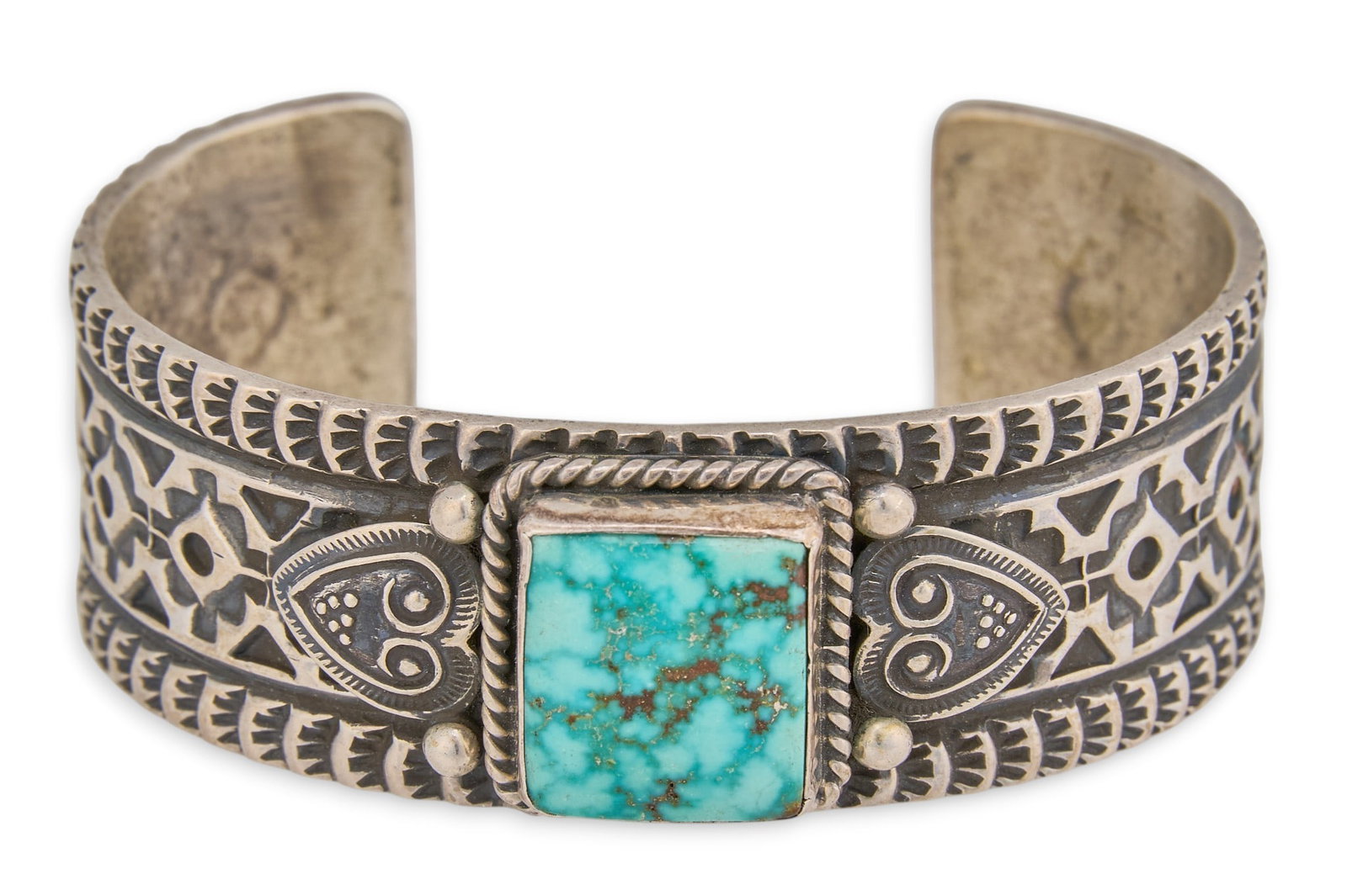 Sunshine Reeves, Navajo Sterling & Turquoise Cuff: Sunshine Reeves, Navajo sterling silver cuff bracelet, set with square turquoise cabochon, with twisted wire and stamped details, signed "Sunshine Reeves Sterling" Circumference: 6.25 in.