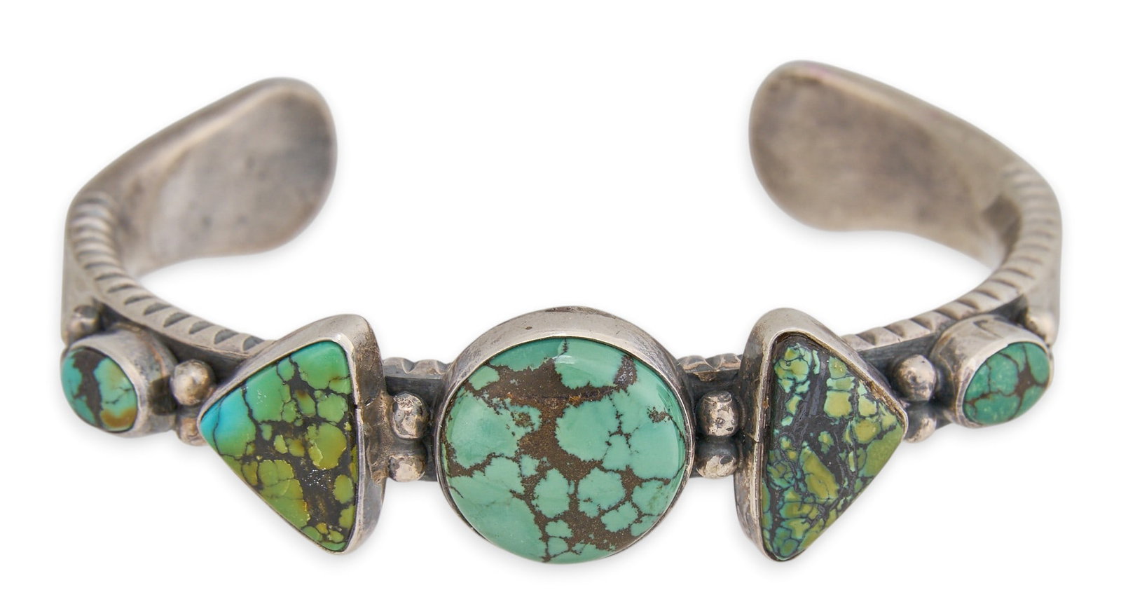 Allison Lee, Navajo Sterling & Turquoise Cuff: Allison Lee, Navajo sterling silver cuff bracelet, set with turquoise cabochons and stamped details, marked "A. Lee Sterling" Circumference: 6.5 in. Total weight: 52.4 g Provenance: