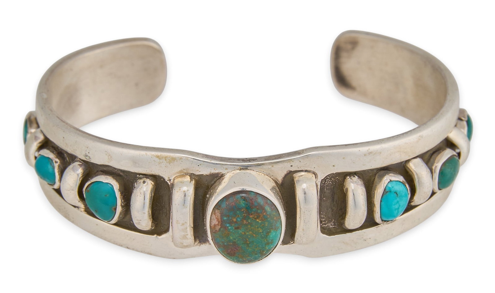 Julian Lovato, Kewa Sterling & Turquoise Cuff: Julian Lovato, Kewa sterling silver cuff bracelet, set with turquoise cabochons, marked "J. Lovato Sterling IHM" Circumference: 7.5 in. Total weight: 44.6 g Provenance: Property from