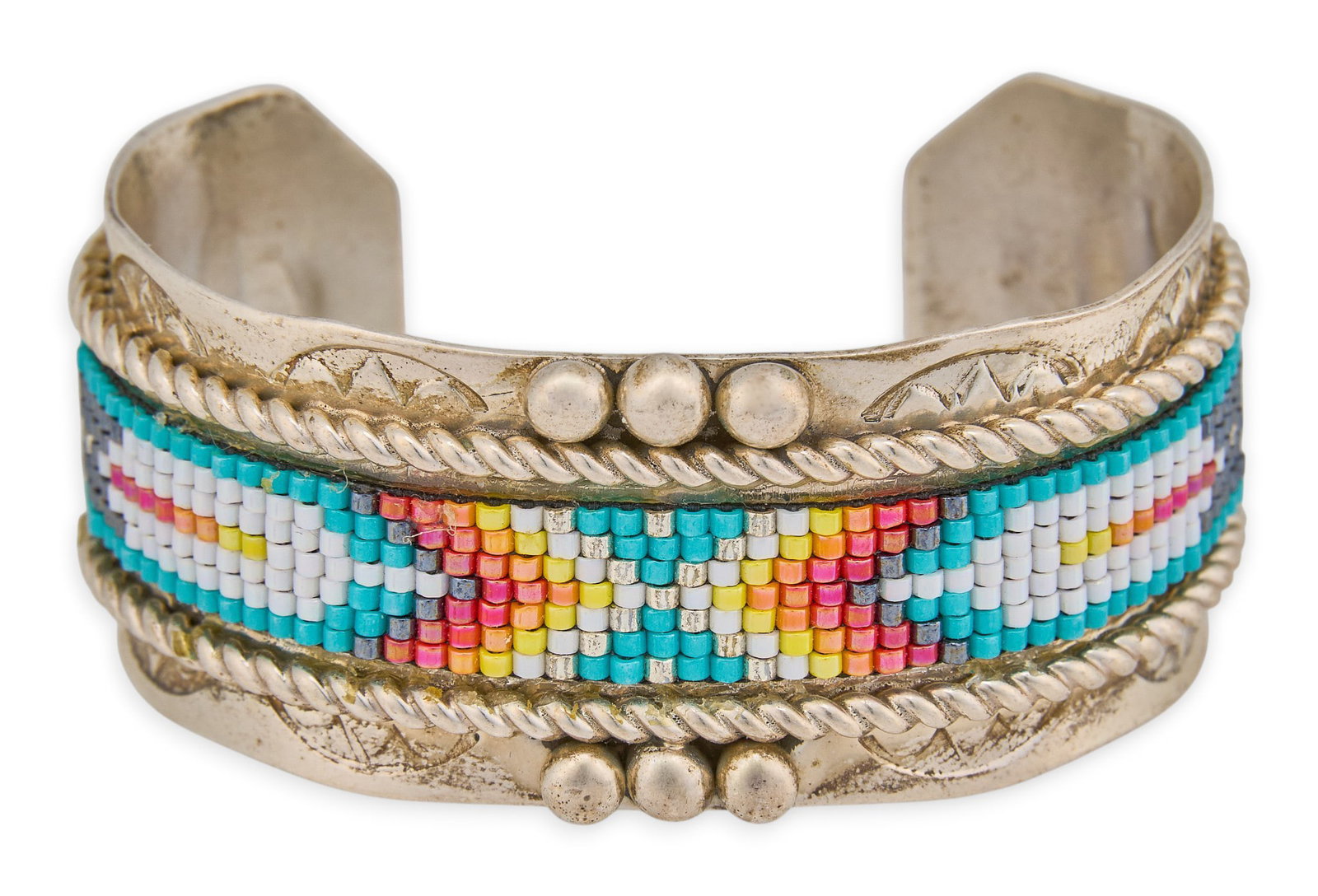 Sterling Silver Beadwork Cuff: Sterling silver cuff bracelet, set with rows of beadwork and stamped details signed "Jermaine Sterling" Circumference: 6.25 in. Total weight: 42.7 g Provenance: Property from a home in