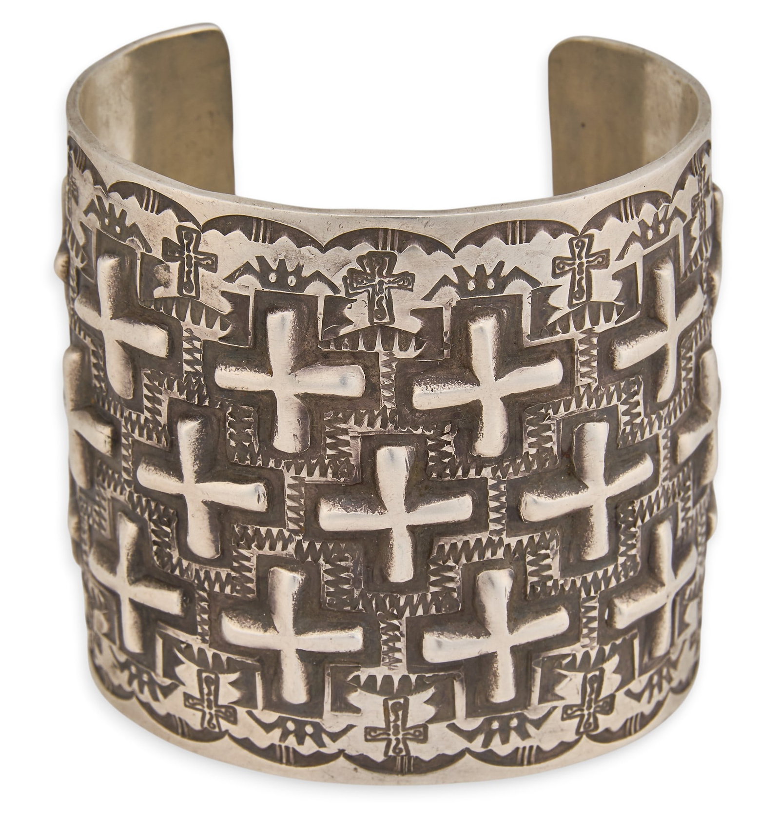 Ronnie Willie, Navajo Sterling Silver Cross Cuff: Ronnie Willie, Navajo sterling silver cuff bracelet, featuring cross motifs and stamped details throughout, signed "Ronnie Willie Sterling" Circumference: 7.25 in. Total weight: 166.4 g