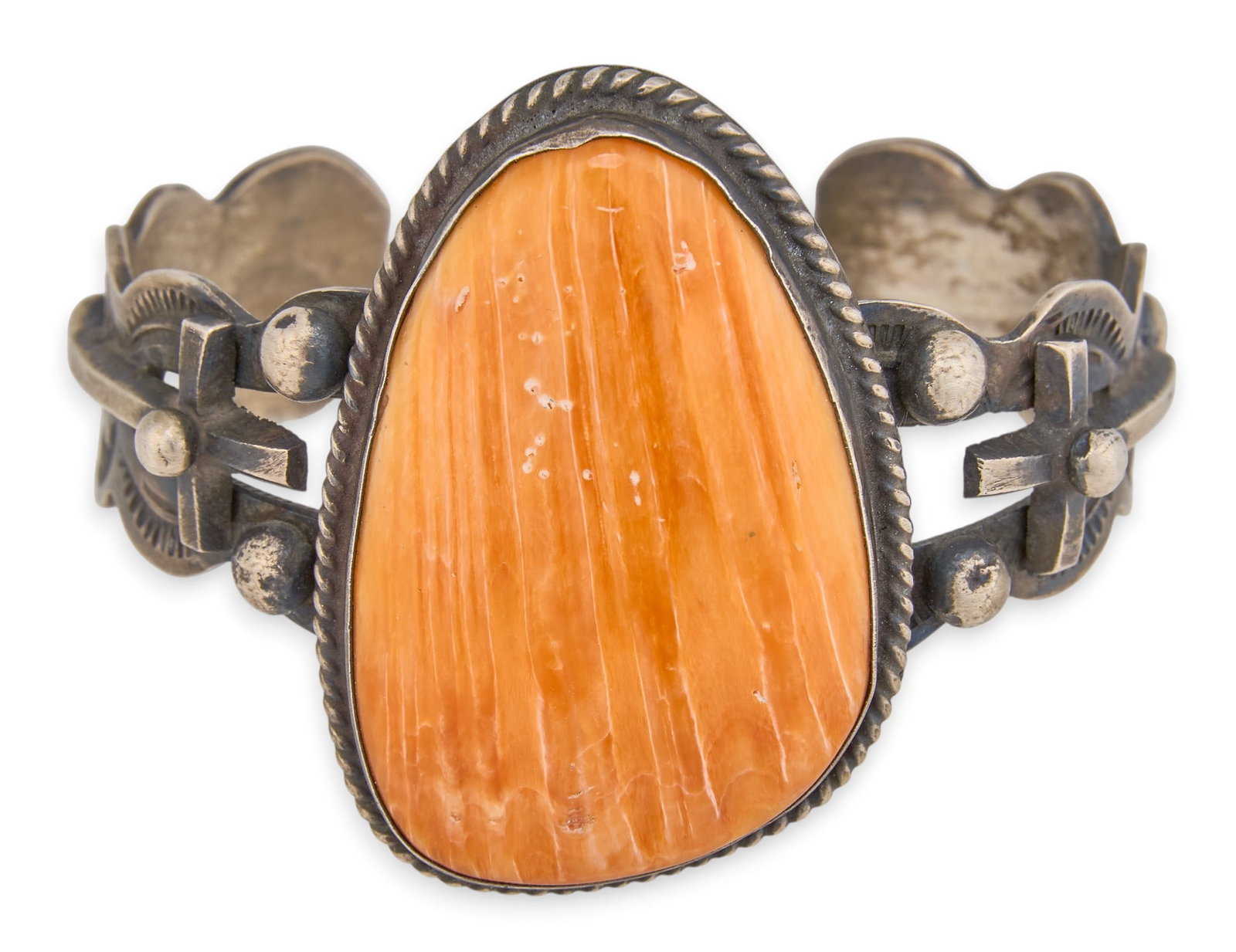 Chimney Butte, Navajo Sterling & Spiny Oster Cuff: Chimney Butte, Navajo sterling silver cuff bracelet, set with large spiny oyster stone, featuring cross motifs and stamped details throughout, signed and marked "Sterling" Circumference: